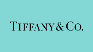 Tiffany & Co. logo on a light blue background
