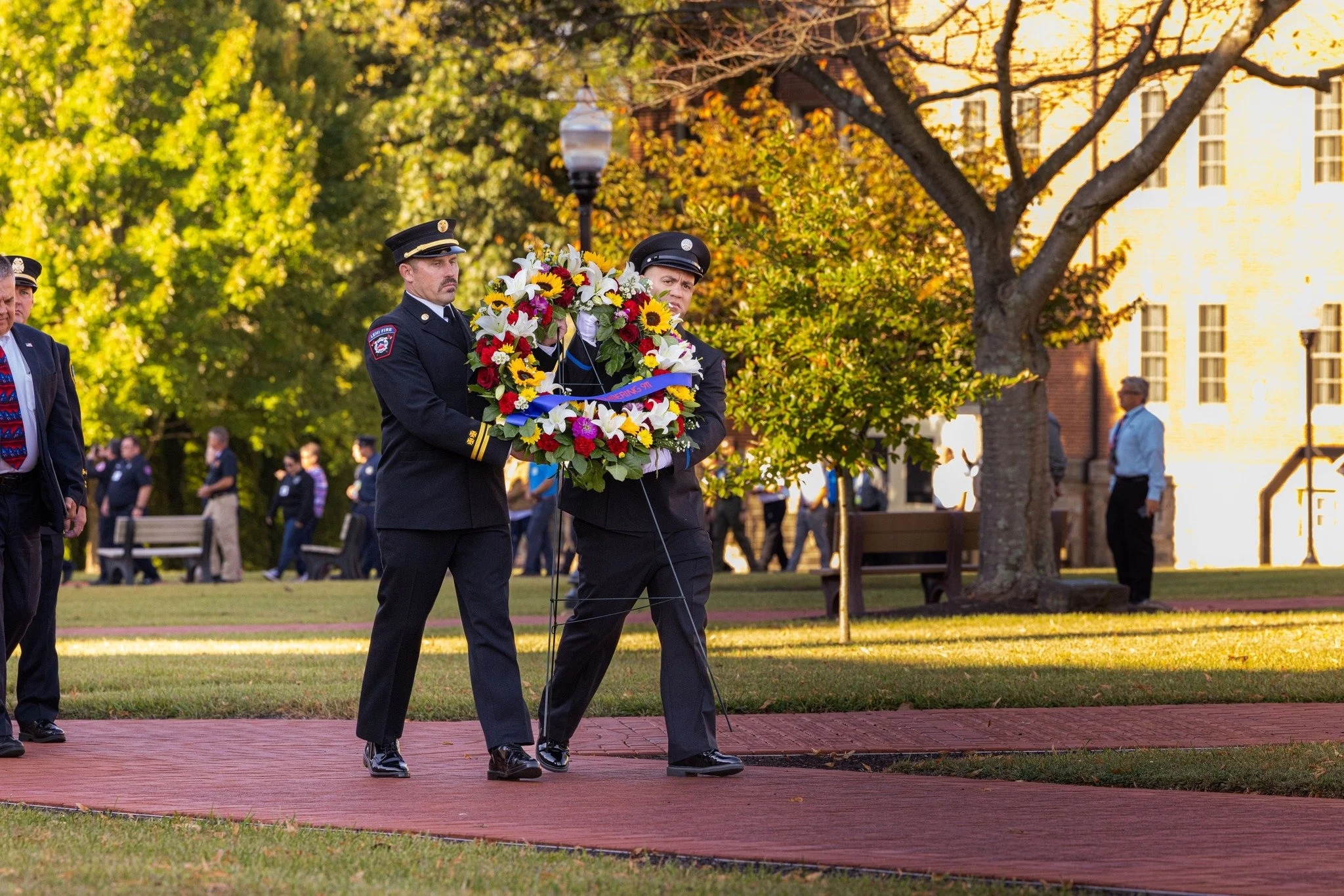wreath procession at NETC 9/11 memorial services in 2024