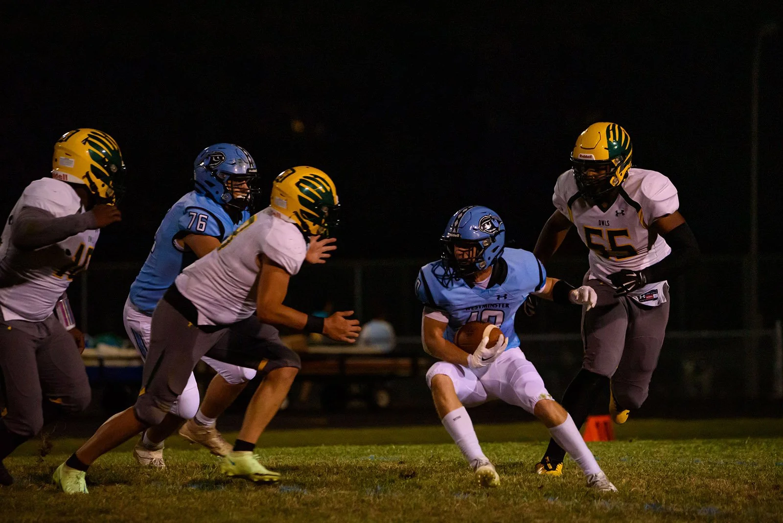 Westminster High School football game action