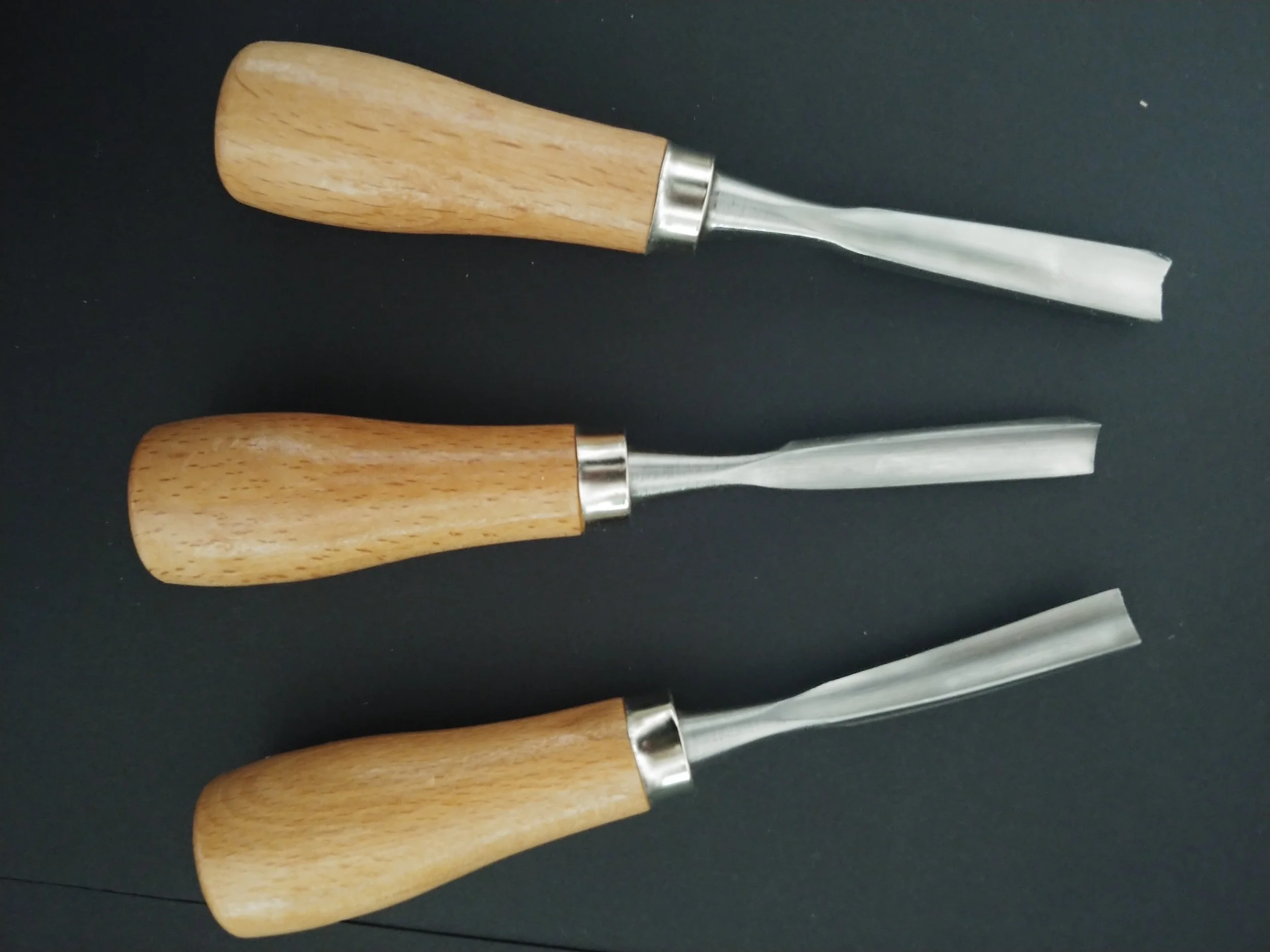 Chisels with scooped ends