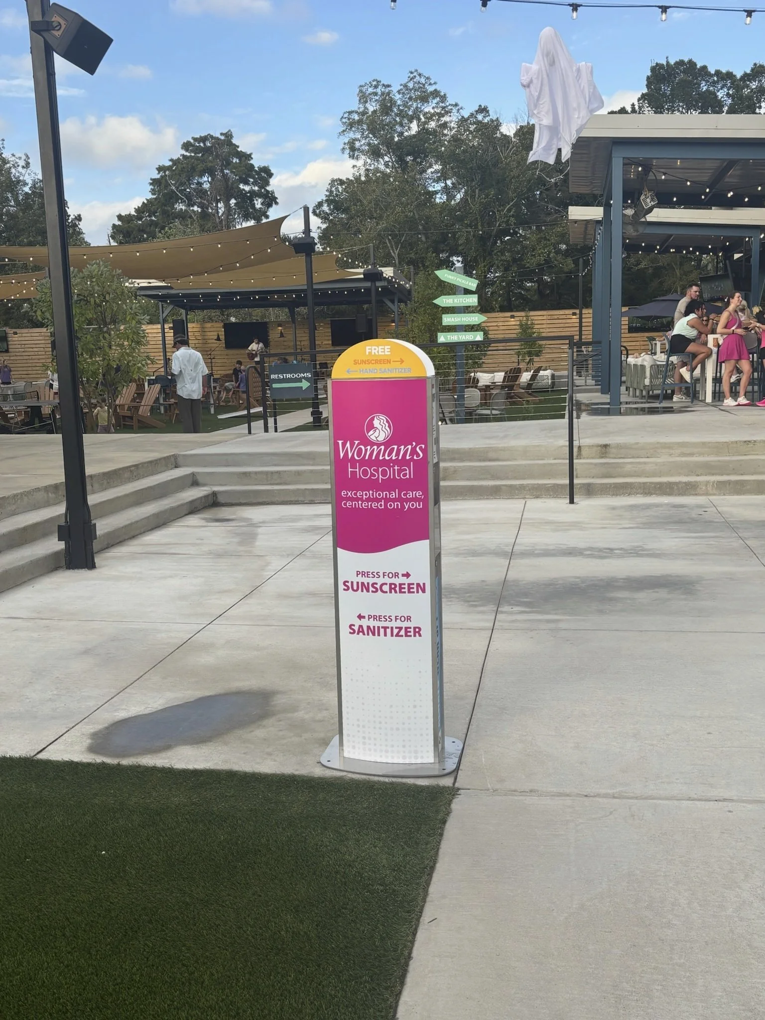 Vital Signs Media sunscreen kiosk sponsored by Woman's Hospital at Court to Table, pickle ball courts. 