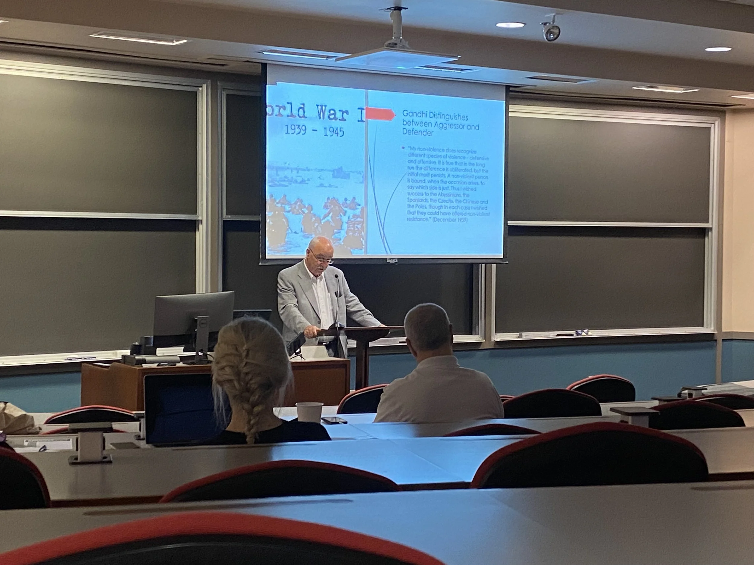 Wolfgang Palaver presents on Gandhi's distinction between the violence of the oppressor and the violence of the defender