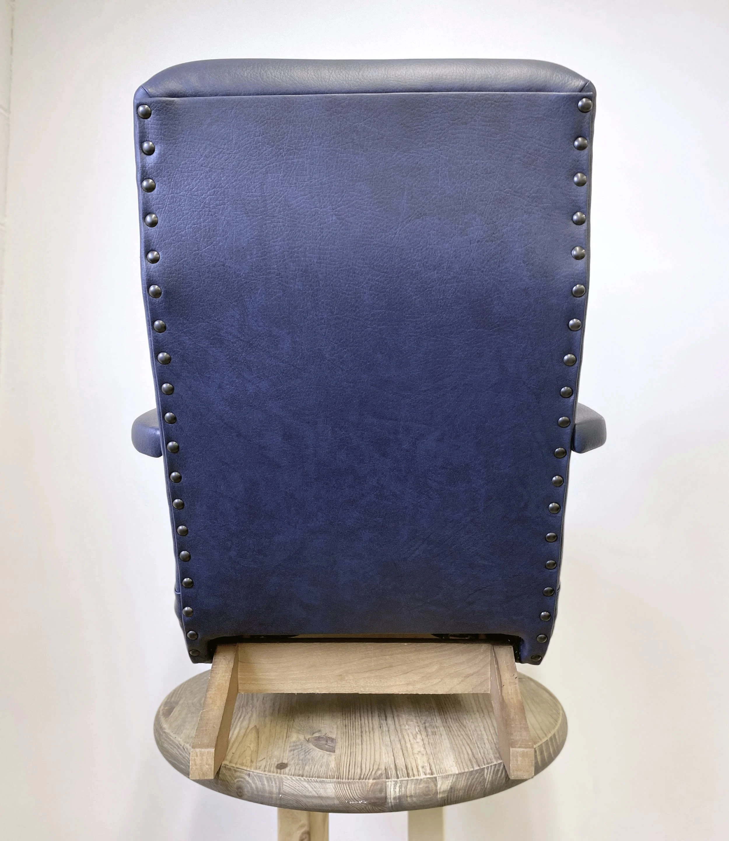 vintage children's rocking chair reupholstered in navy blue vinyl - back view
