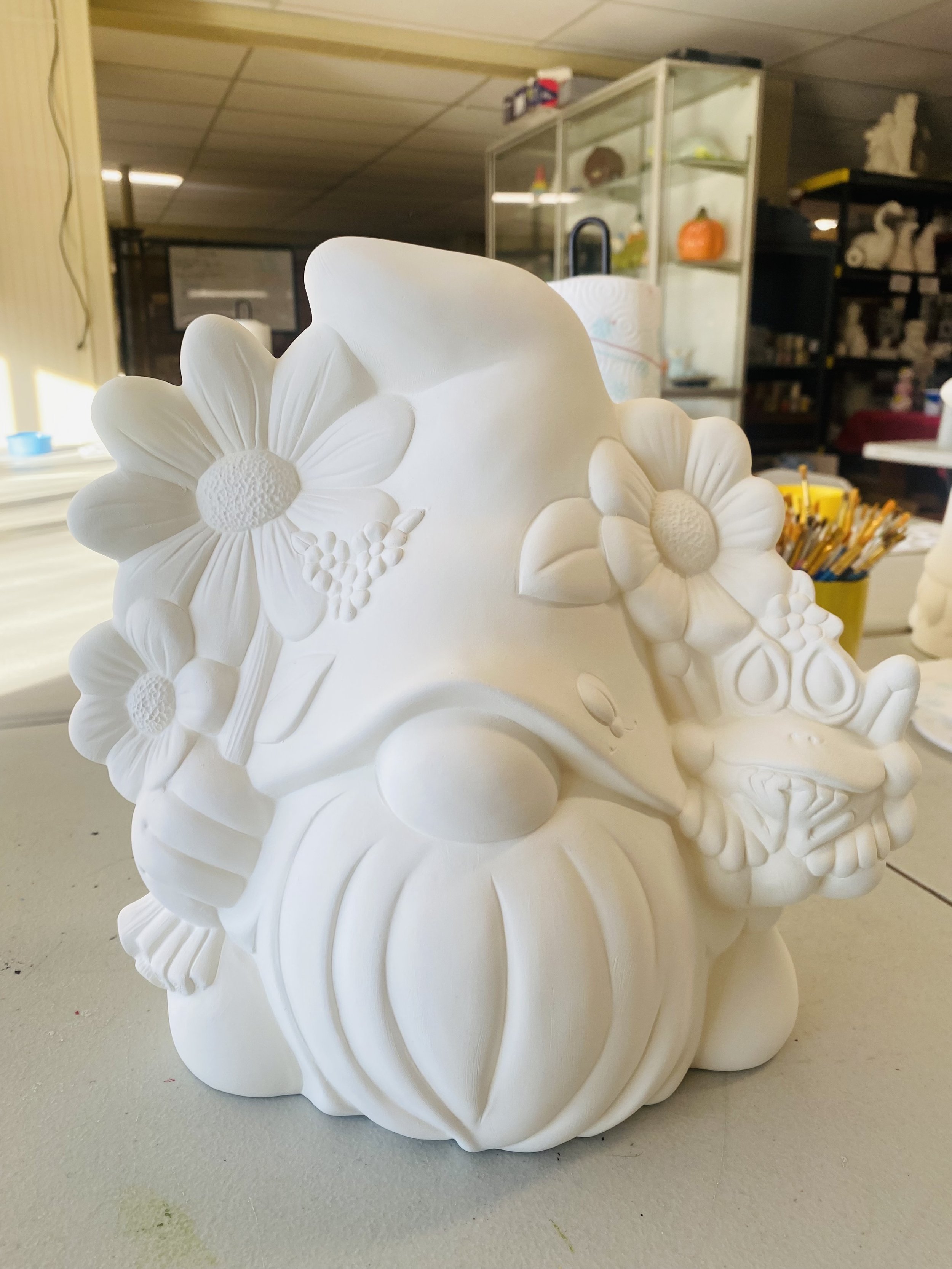 Gnome holding Frog