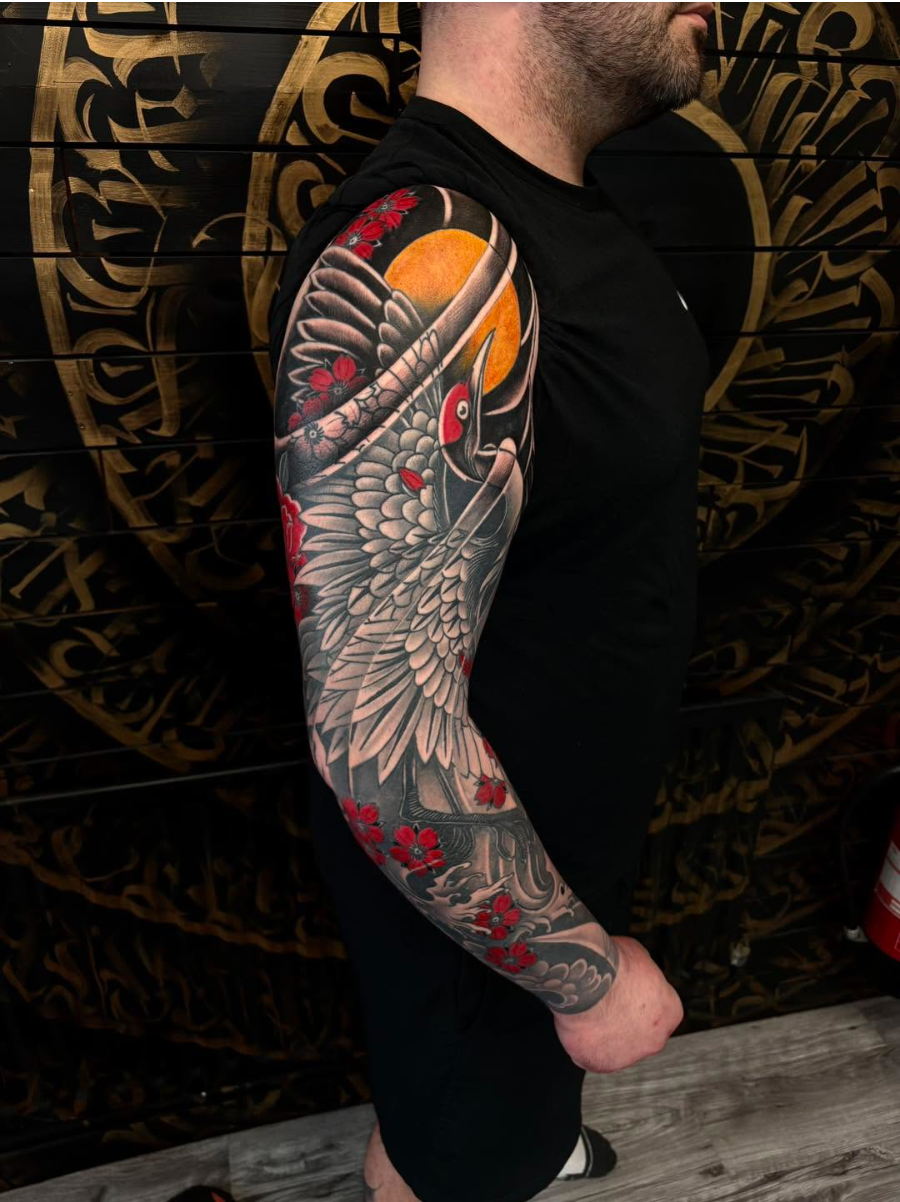 Colour Japanese crane tattoo sleeve by Cloak and Dagger Collective, Antrim