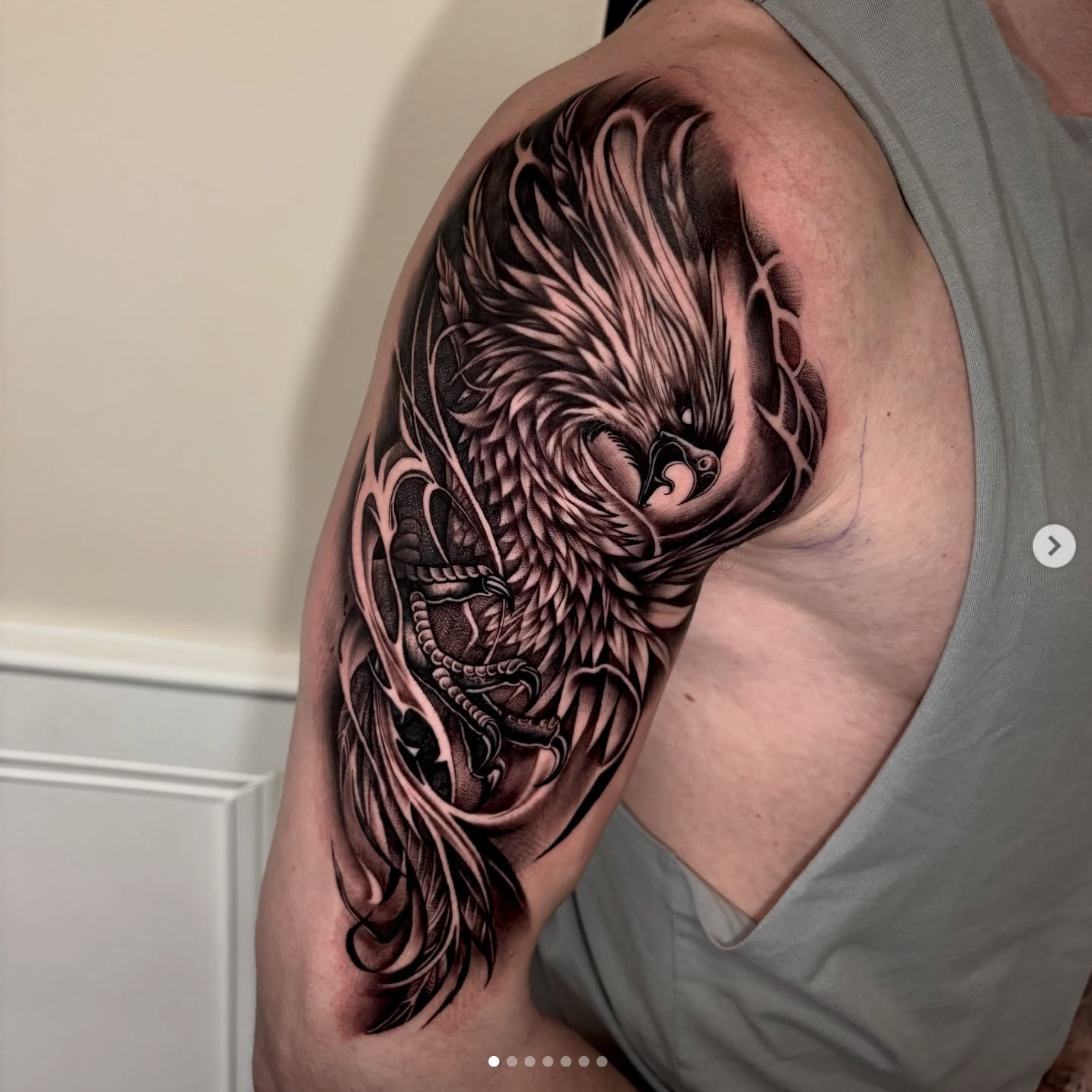 Black and grey phoenix tattoo on shoulder, Cloak and Dagger Collective, Antrim