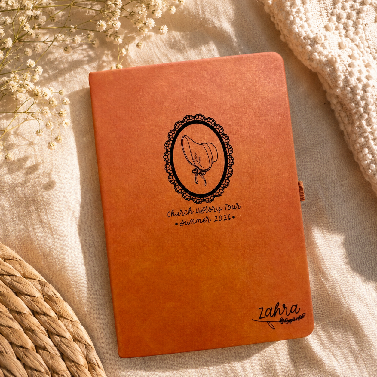 Personalized engraved leather journal with wildflowers.
