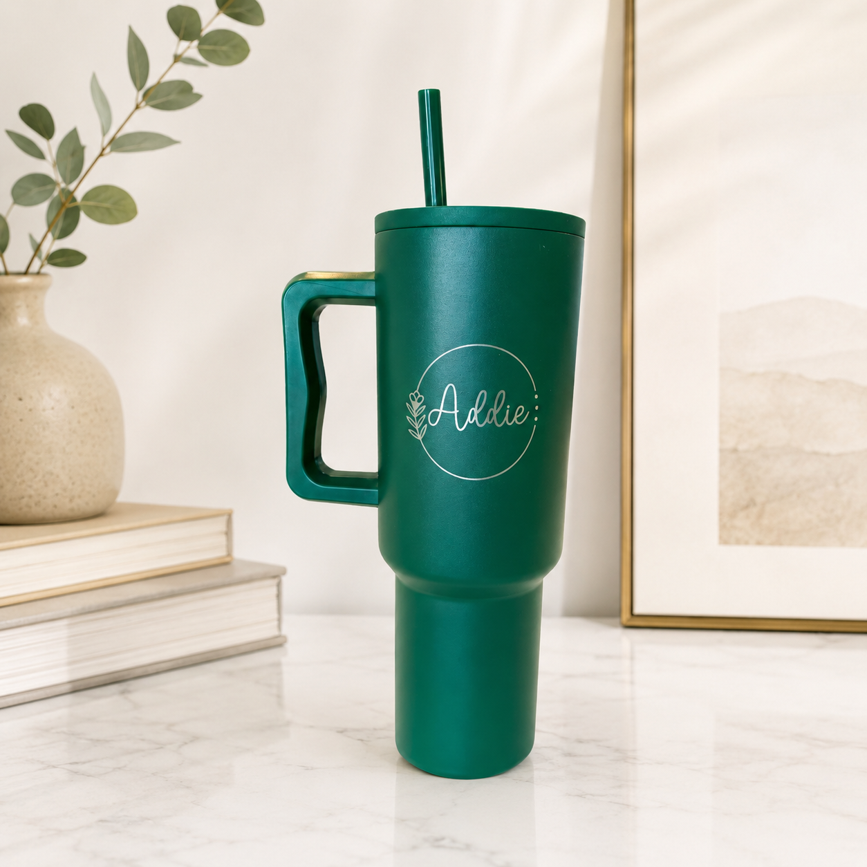 Stainless steel tumbler with custom monogram engraving.