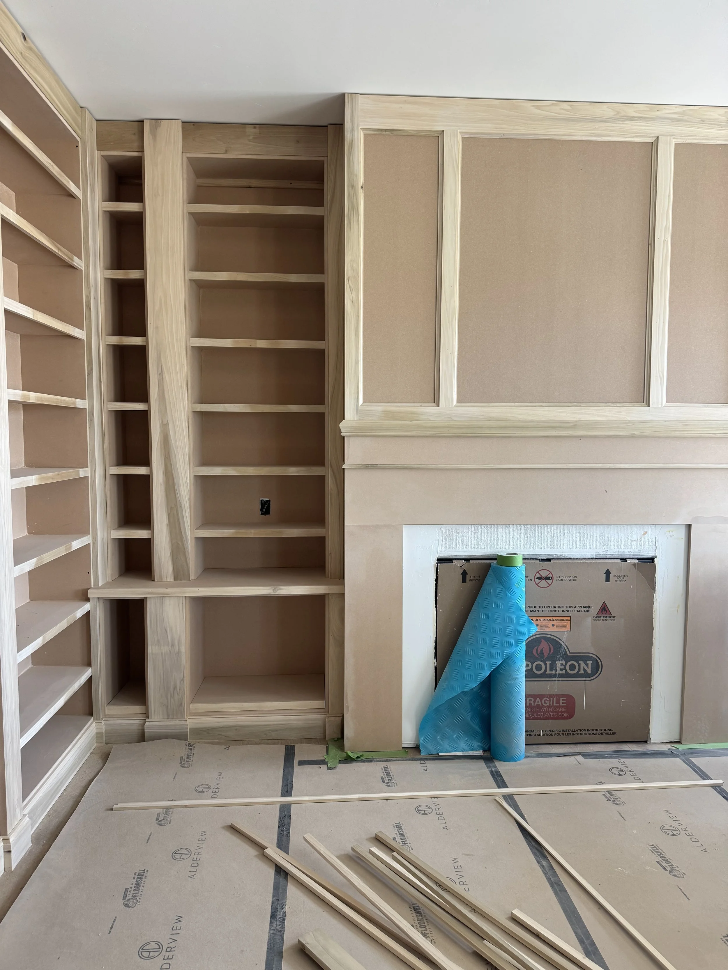 custom library bookshelf millwork with fireplace