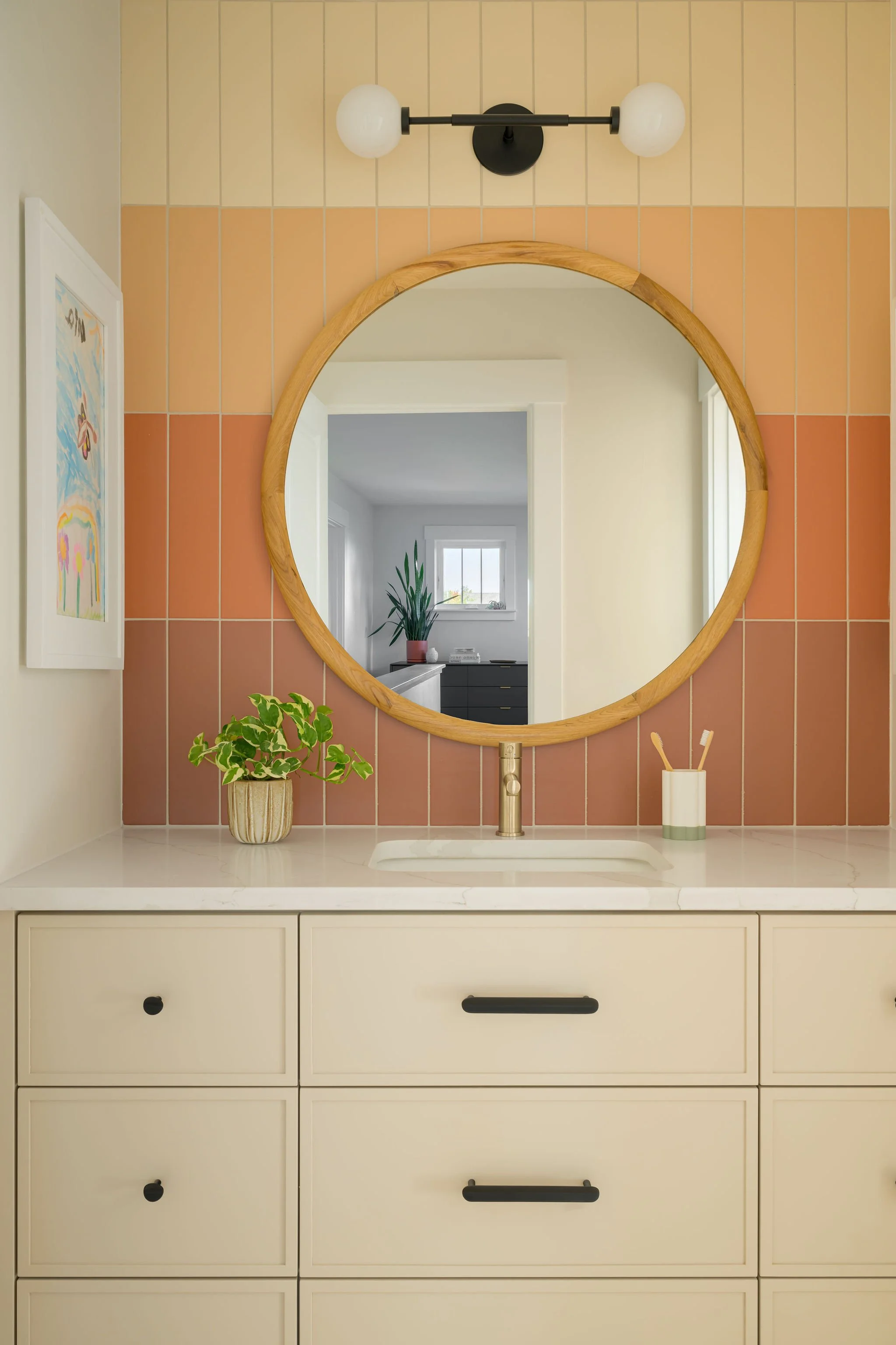 Kids bathroom vanity with ombre tile backsplash and playful surf-inspired details