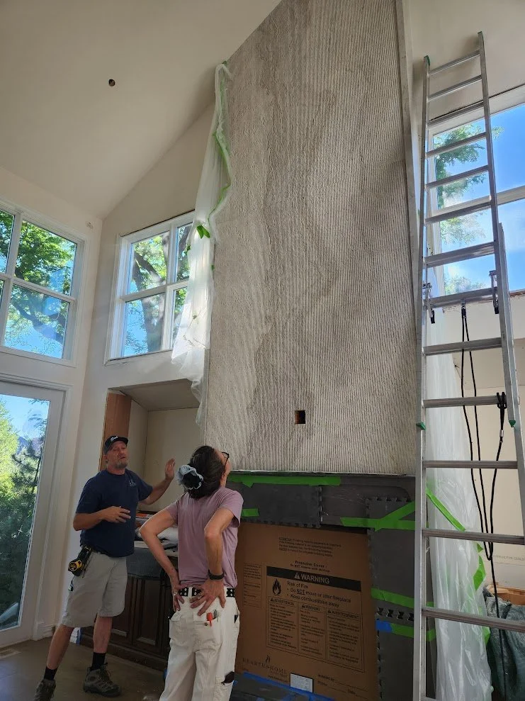 raked stone double height fireplace