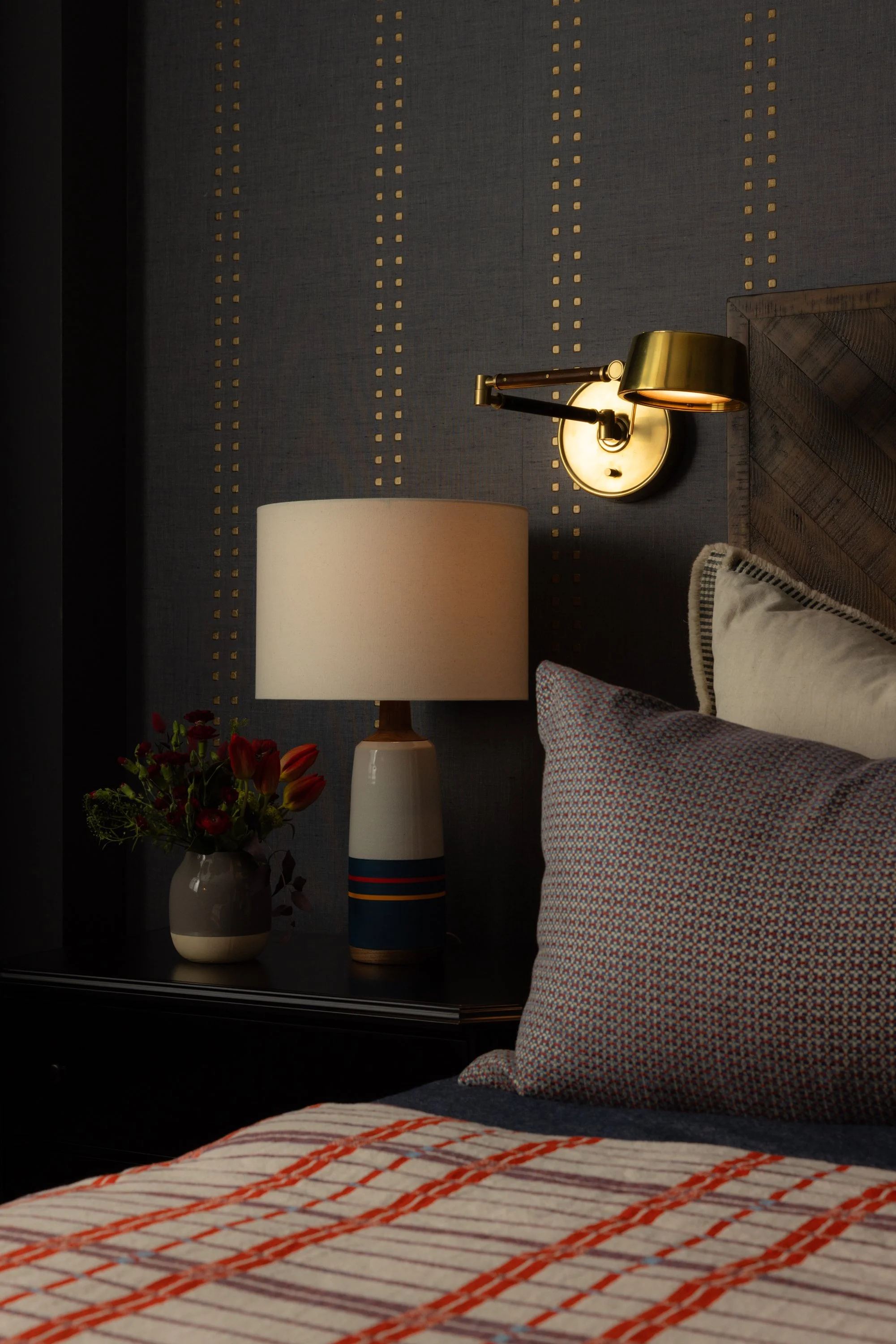 Cozy blue bedroom with grasscloth wallpaper & modern masculine bedding
