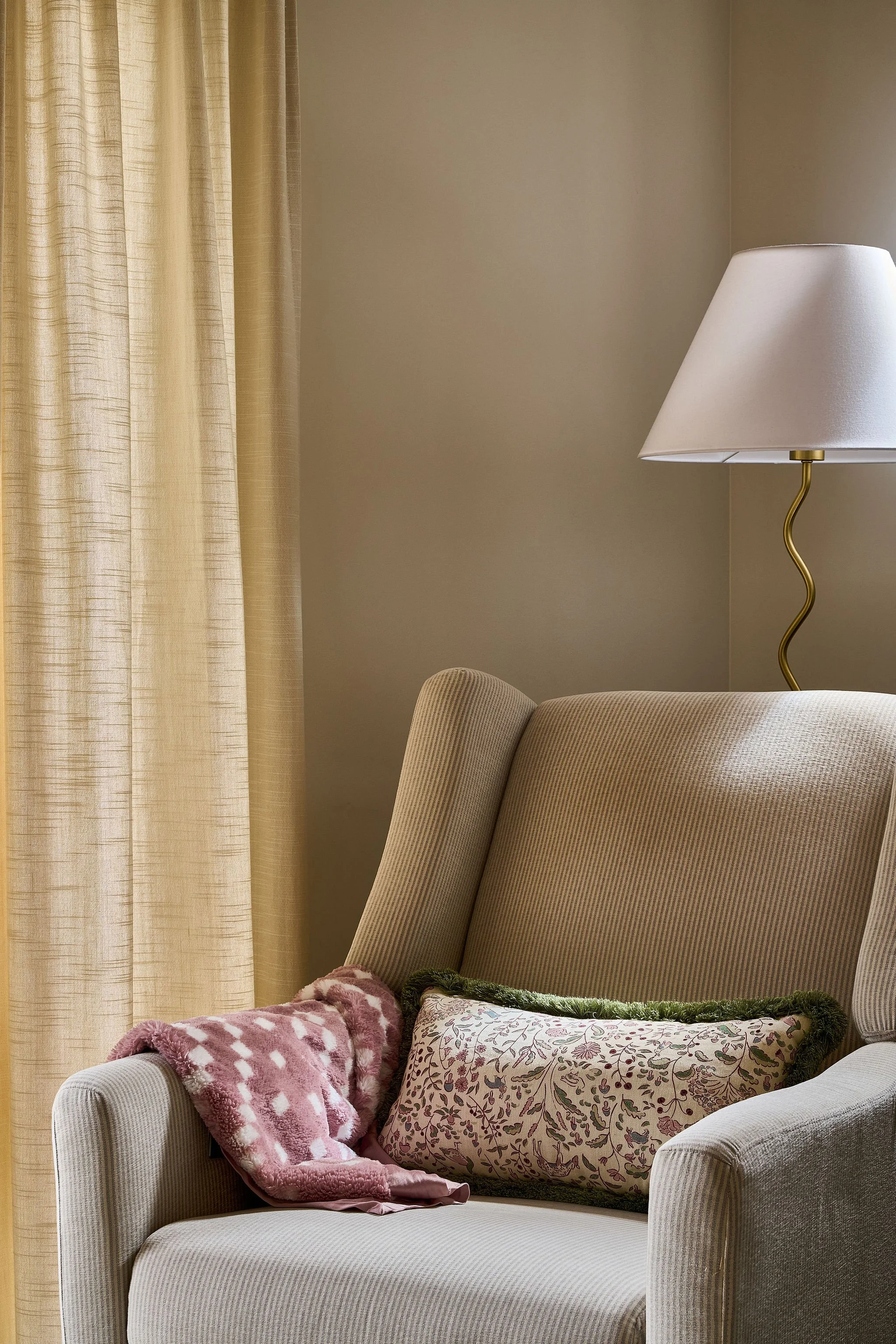 nursery lounge chair pink blanket