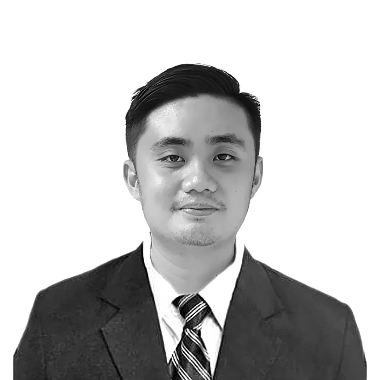 Black and white portrait of Philip in a suit with striped tie