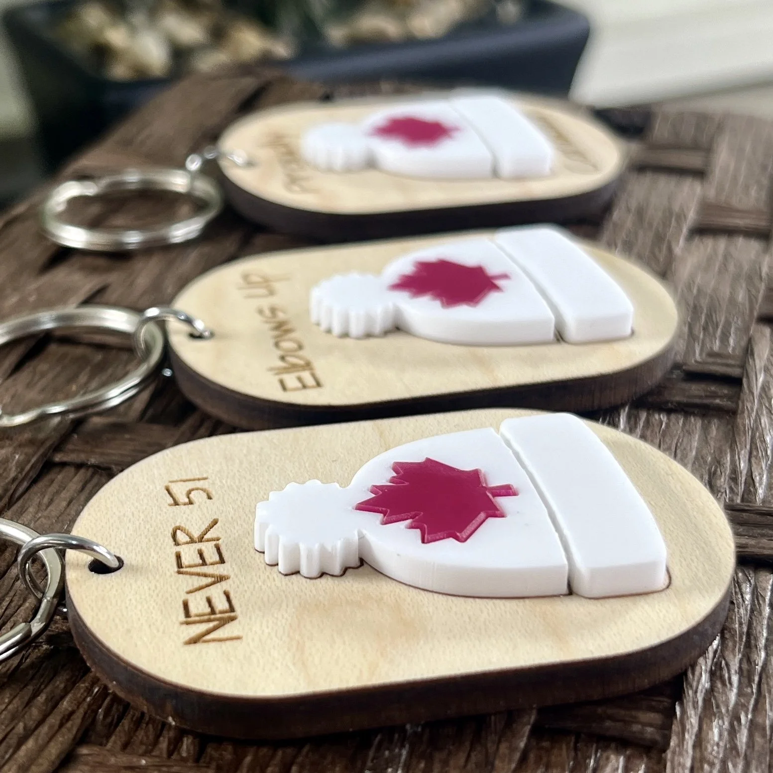 side view canadian toque wood keychain matte white acrylic proud Canadian gift.