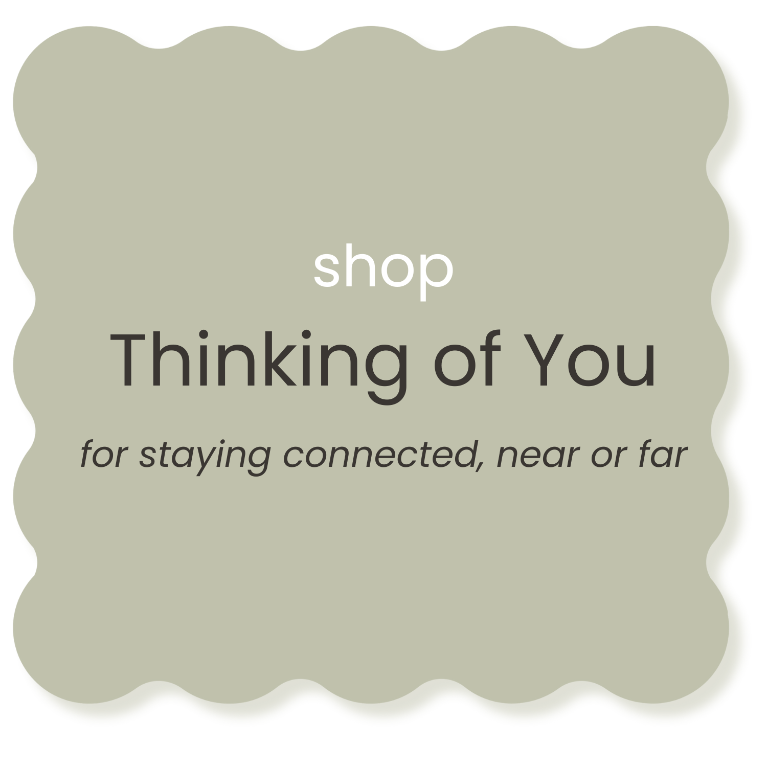 A green decorative sign with scalloped edges displaying the message: "shop Thinking of You for staying connected, near or far."
