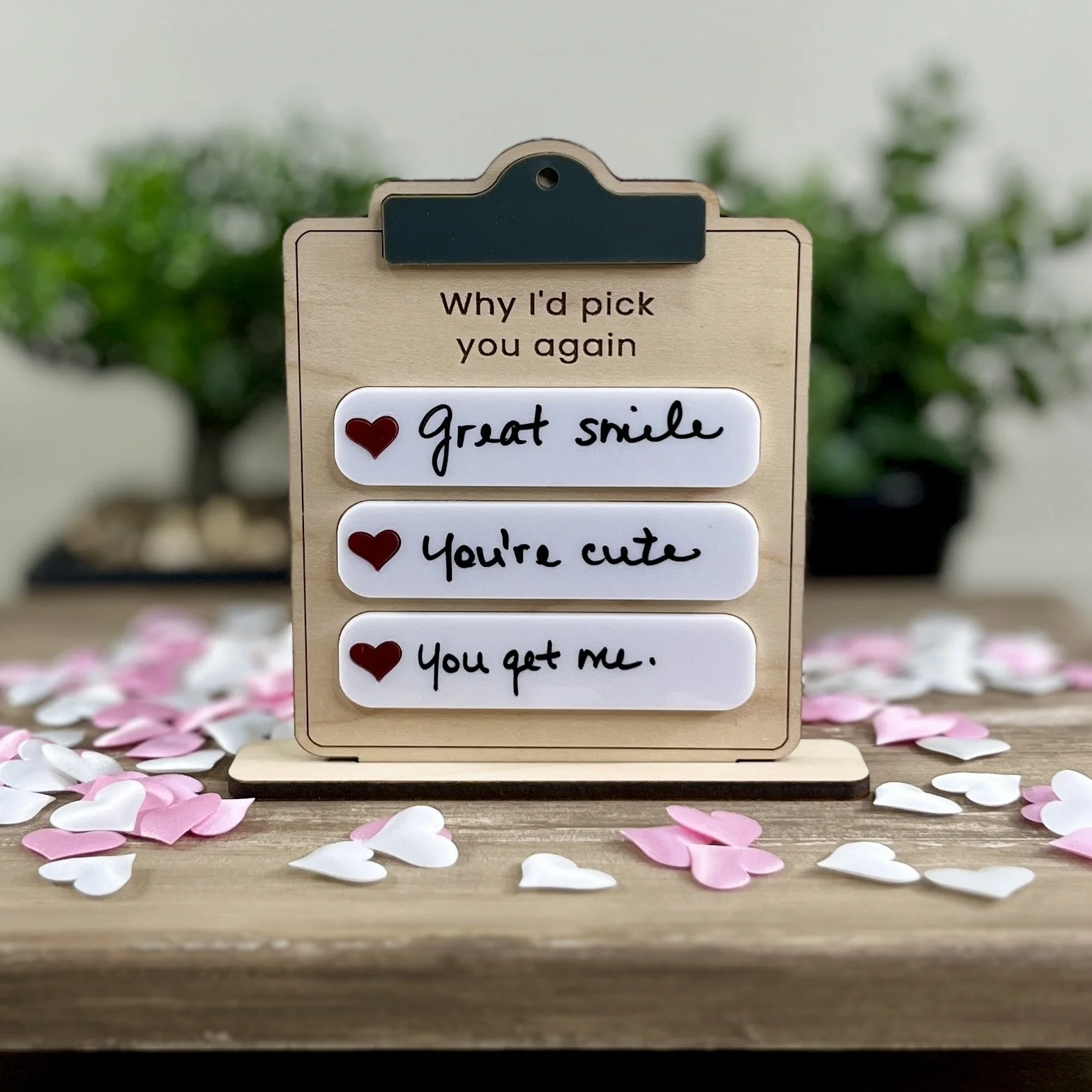 Clipboard-shaped maple wood sign with three dry-erase note sections filled in to demonstrate how to use.