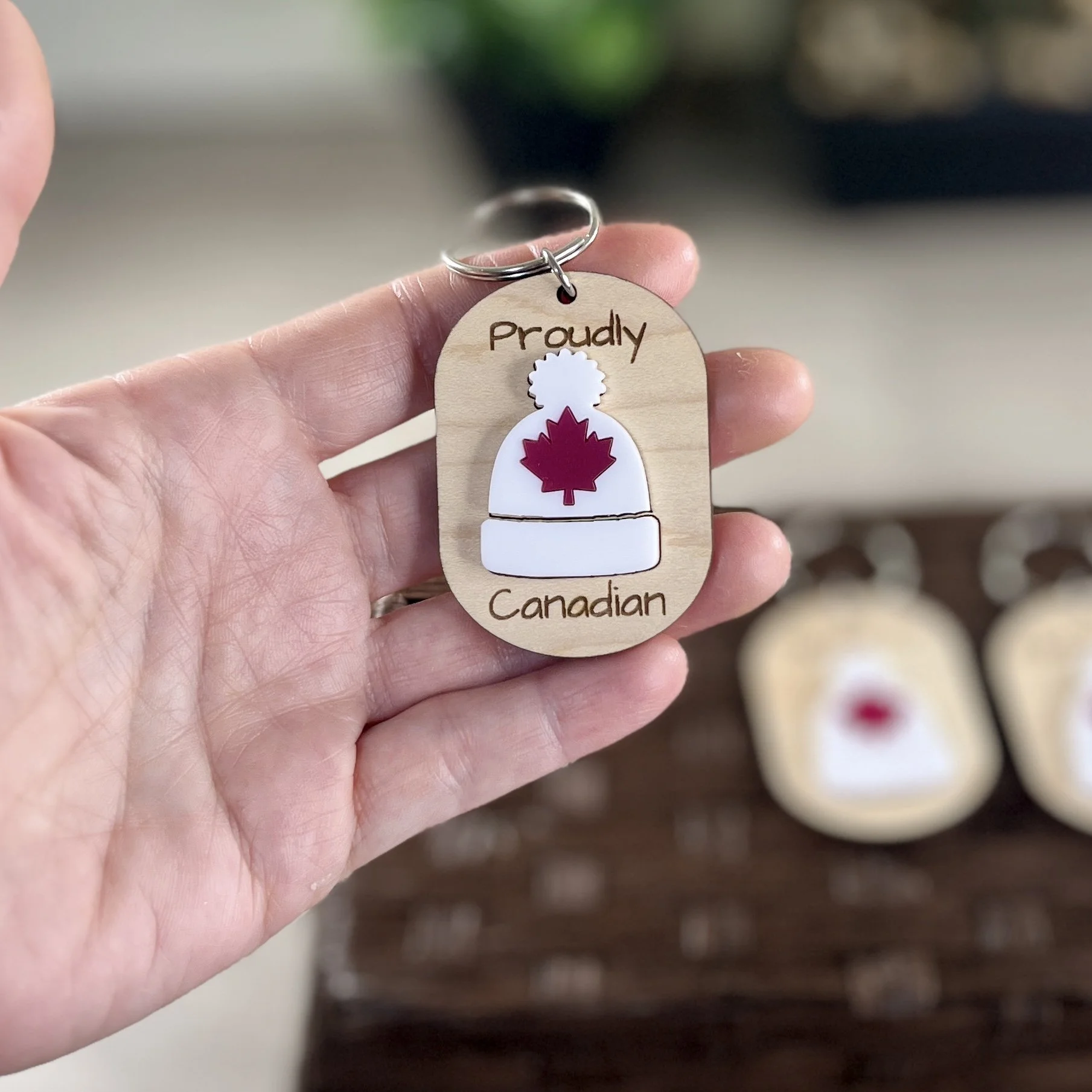 handheld canadian toque wood keychain matte white acrylic proud Canadian gift.