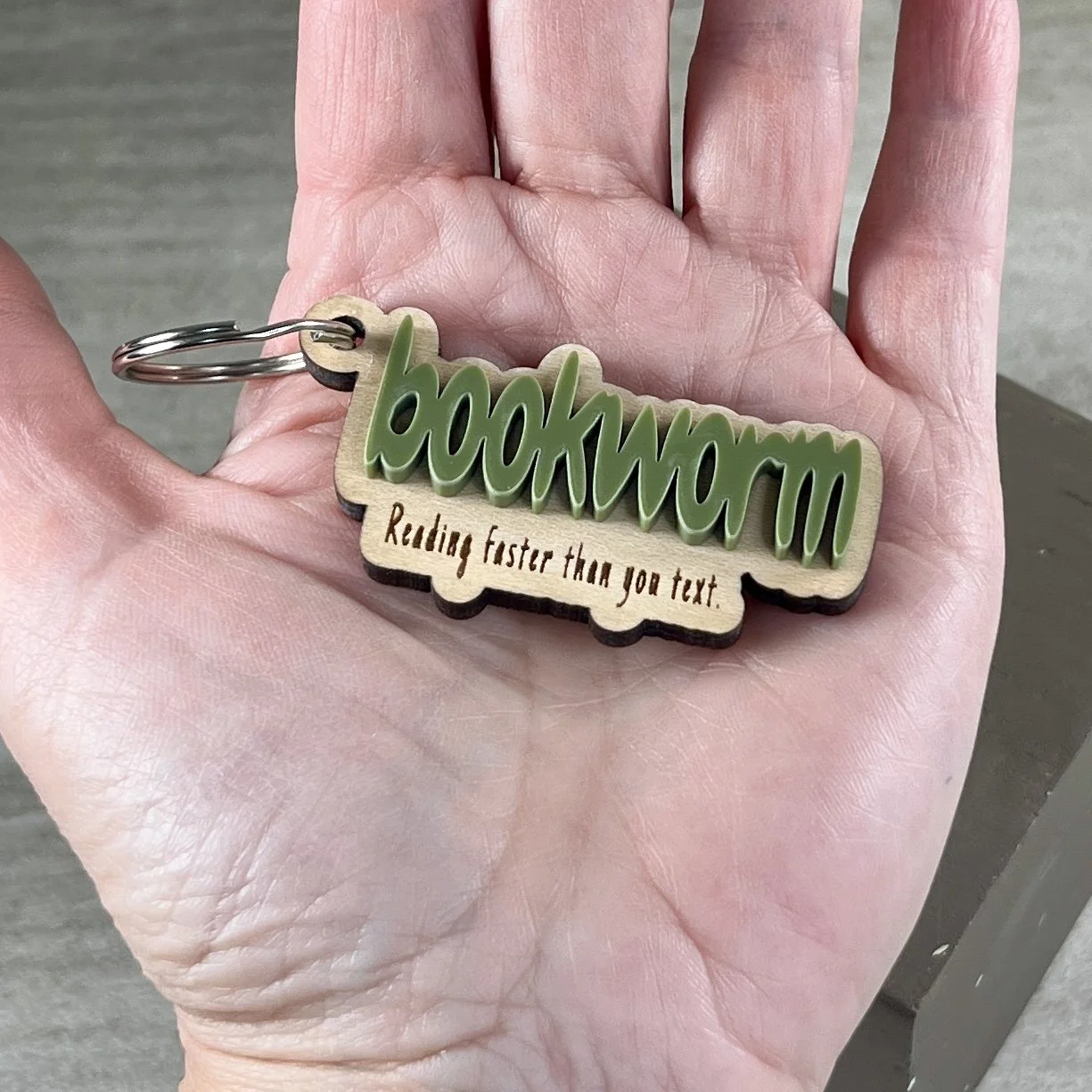 handheld laser cut maple wood keychain olive acrylic bookworm quote book lover gift