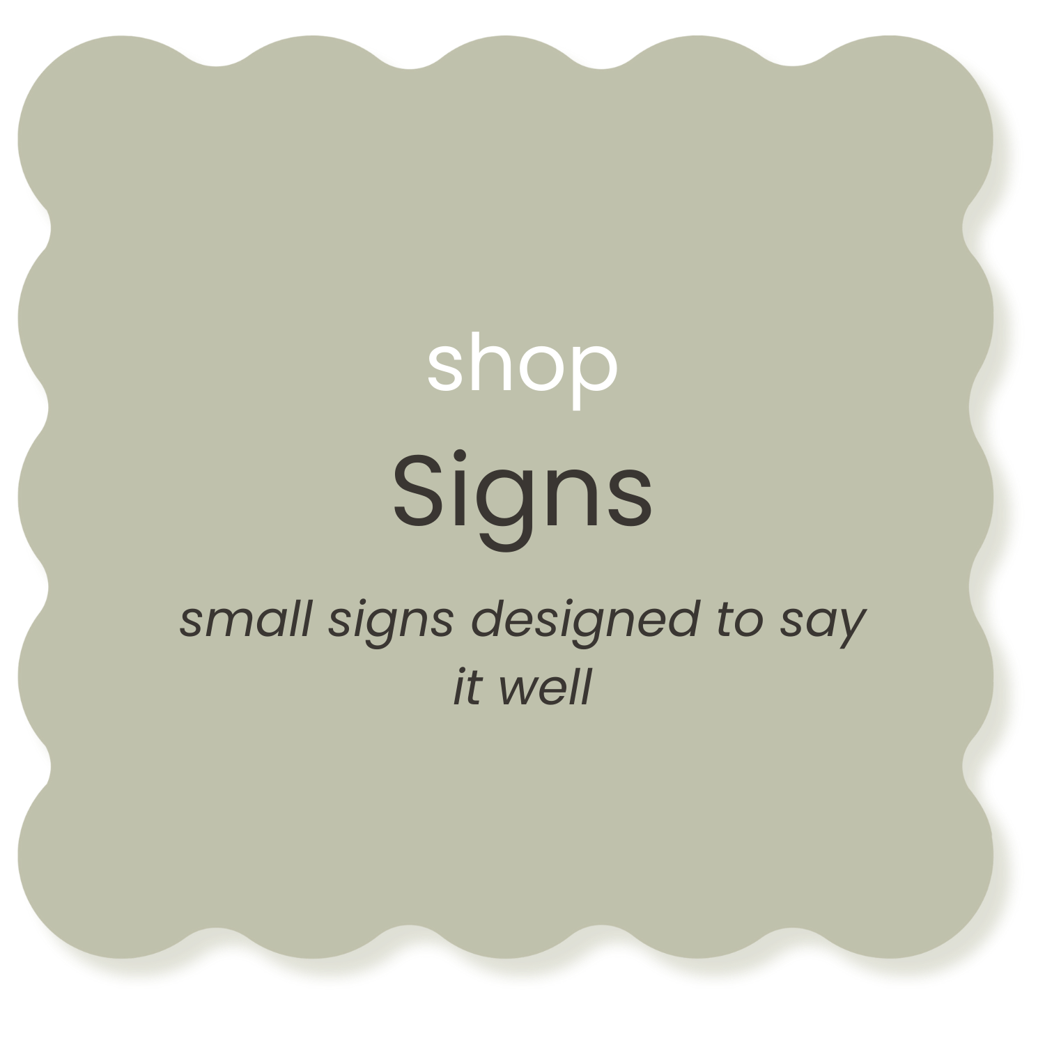 A sign with a scalloped edge, beige background, with the words 'shop signs' in large font and the phrase 'small signs designed to say it well' in italics underneath.