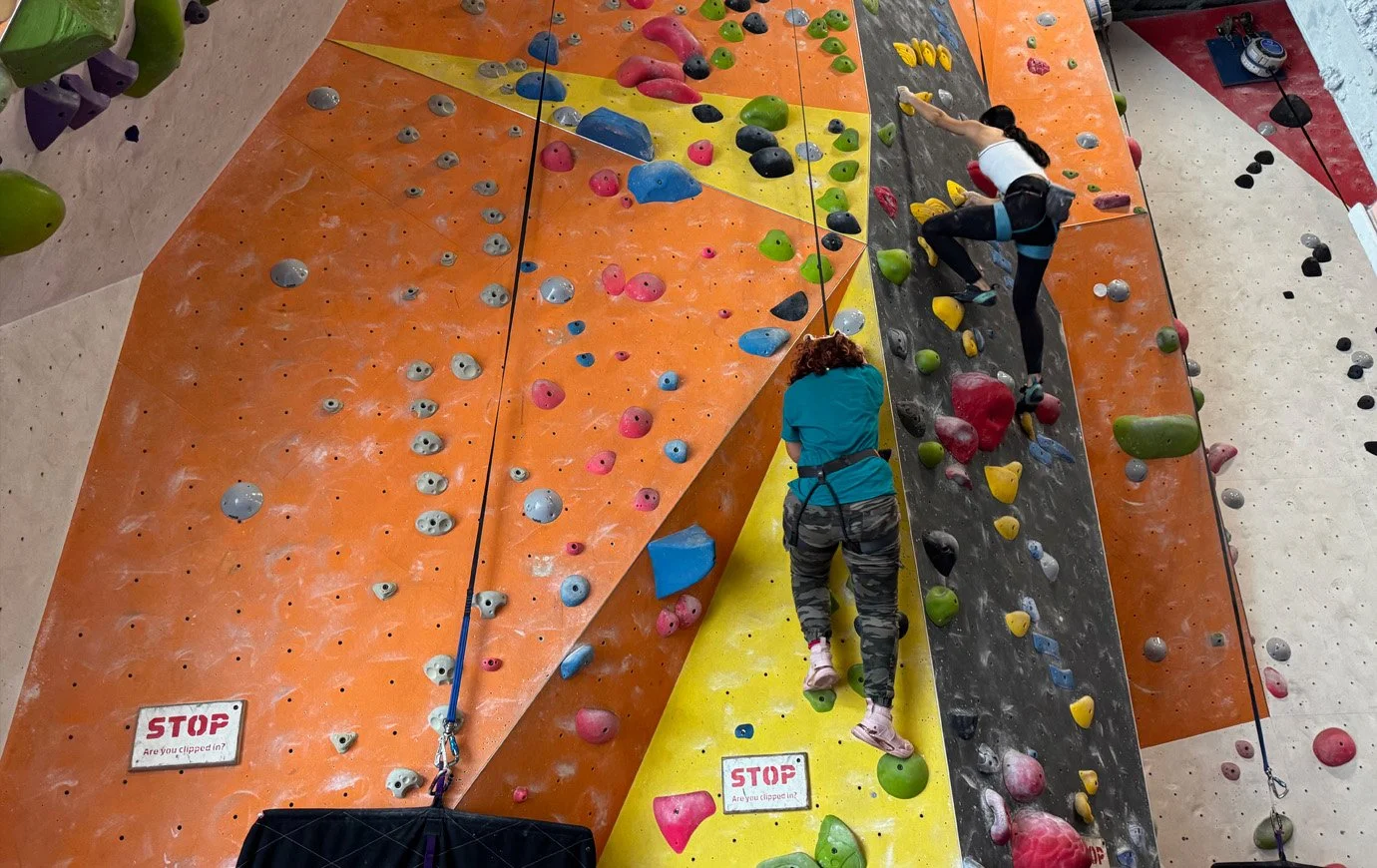 Teens on the climbing walls as part of the afternoon activity
