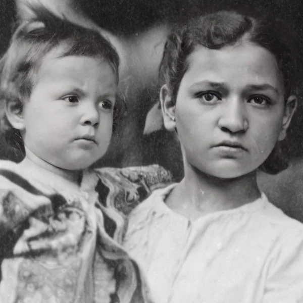 Little Mother, holding her younger sister, 1890s