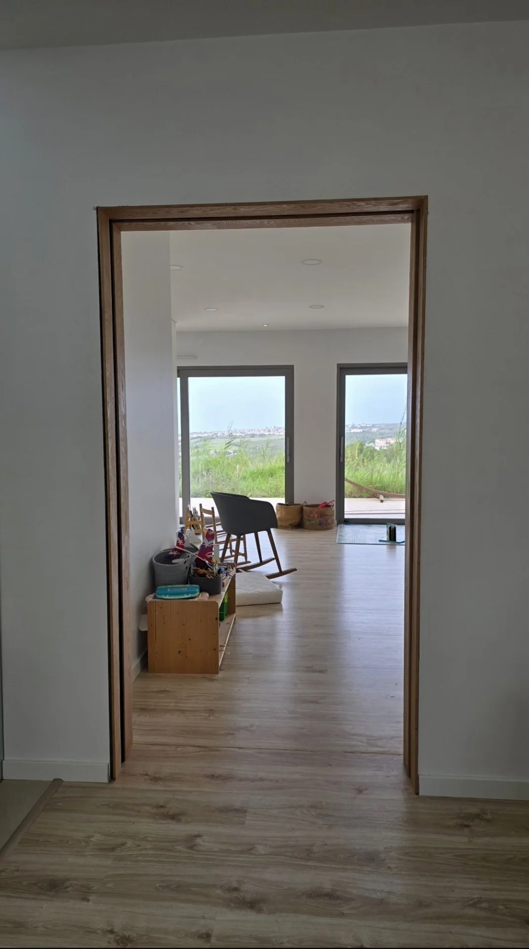 Fully handcrafted solid oak sliding door shown in open position