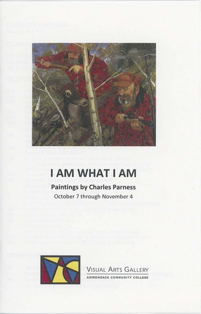 Poster for an art exhibition titled 'I AM WHAT I AM' featuring paintings by Charles Parness, hosted at the Visual Arts Gallery at Adirondack Community College from October 7 through November 4. The poster includes an image of two men in camouflage hunting attire, one aiming a rifle and another holding a rifle in a wooded area.