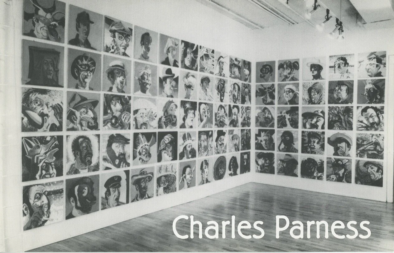 Black and white art gallery corner showing multiple portraits arranged on walls, with the name Charles Parness written. The portraits are stylized drawings of various people's faces.