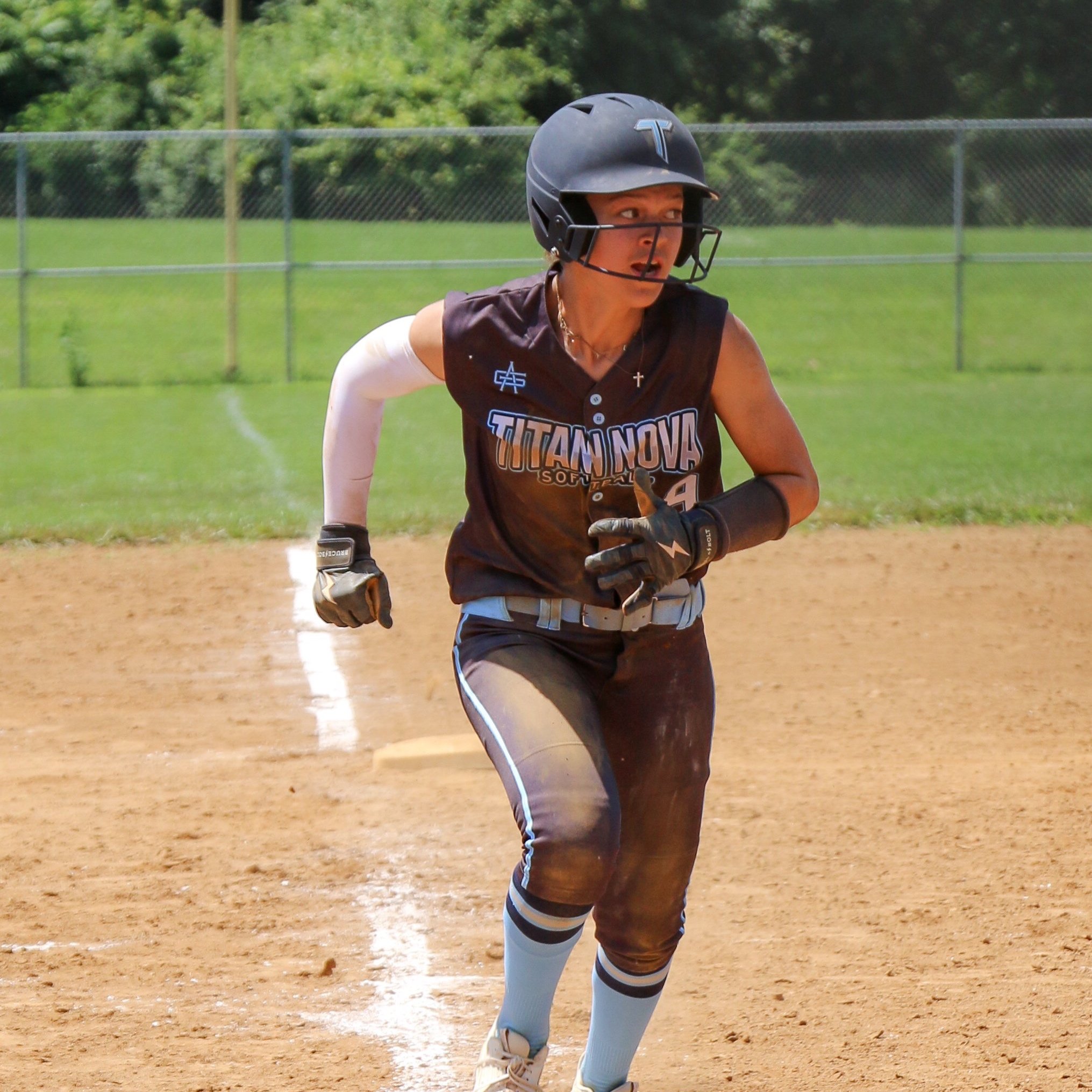 Titan NOVA softball player running bases