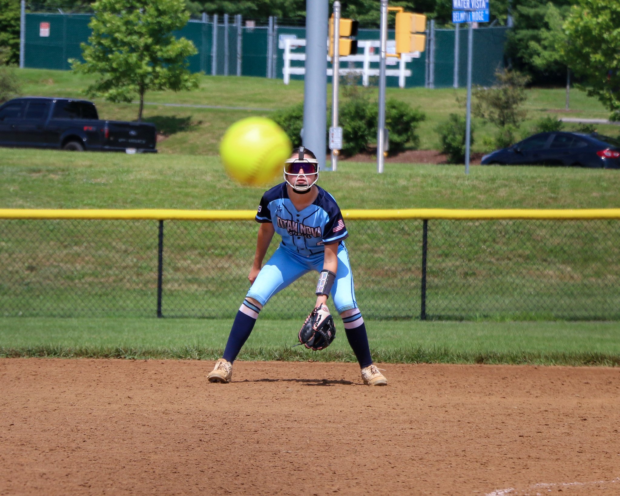 Titan NOVA softball player with her eye on the ball