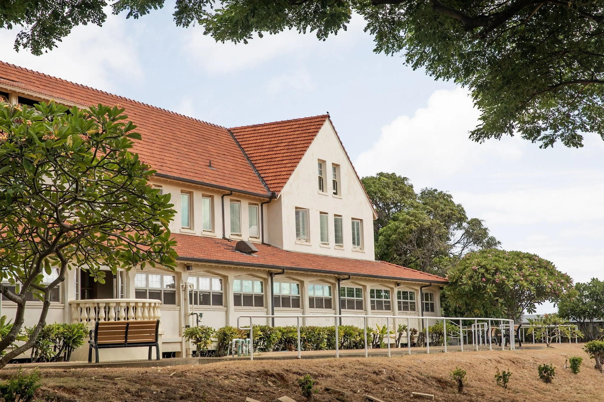 Scenic outside wide view of the Lunalilo Home and surrounding trees
