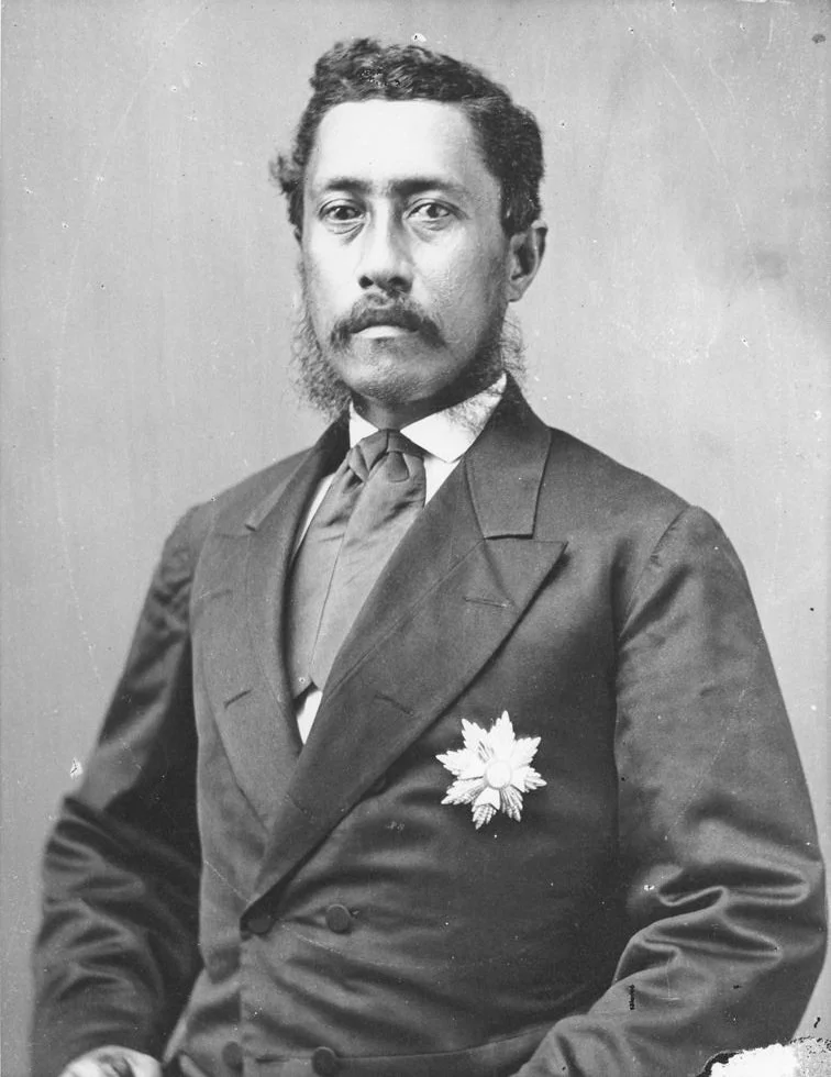 Historical black and white image of King William Charles Lunalilo in a formal suit