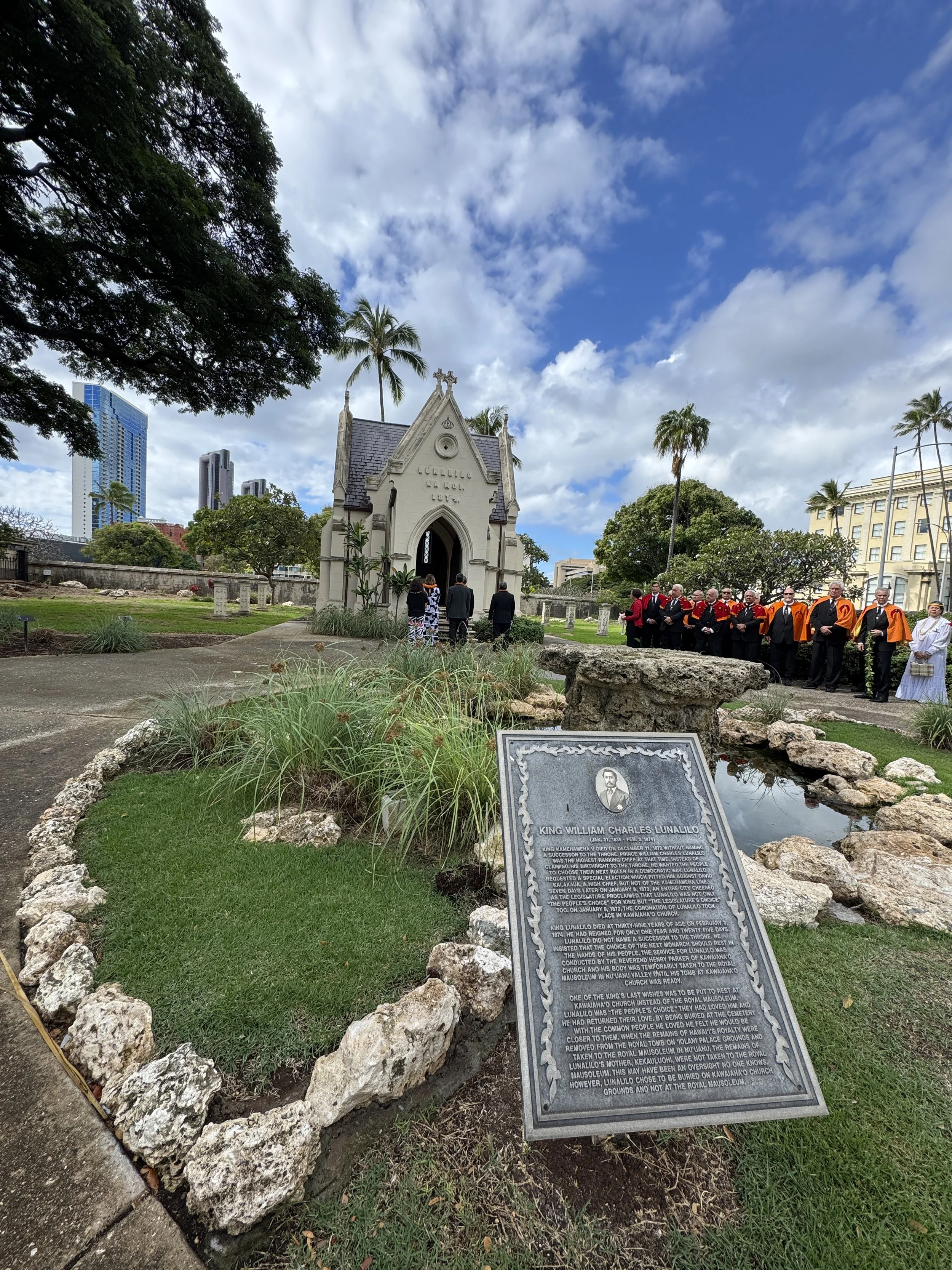 Wide view of the Lunalilo Mausoleum and its stone informational engraving slab