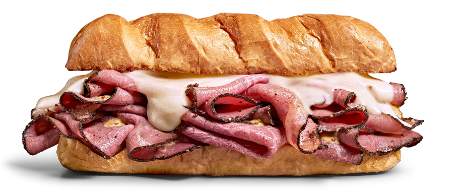 Sandwich with roast beef, melted cheese, and a hoagie bun.