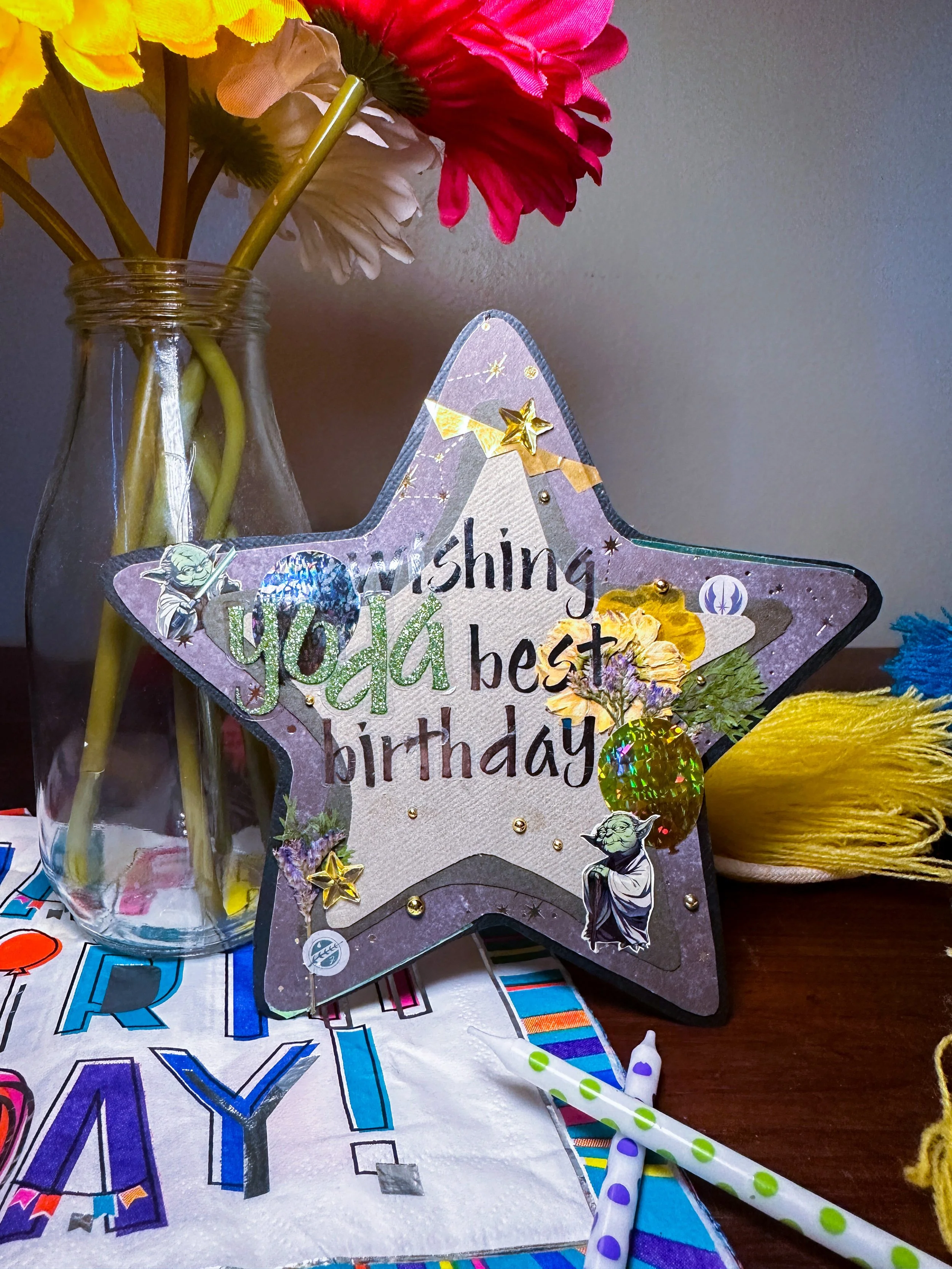handmade star wars themed birthday card with pressed flowers and other embellishments