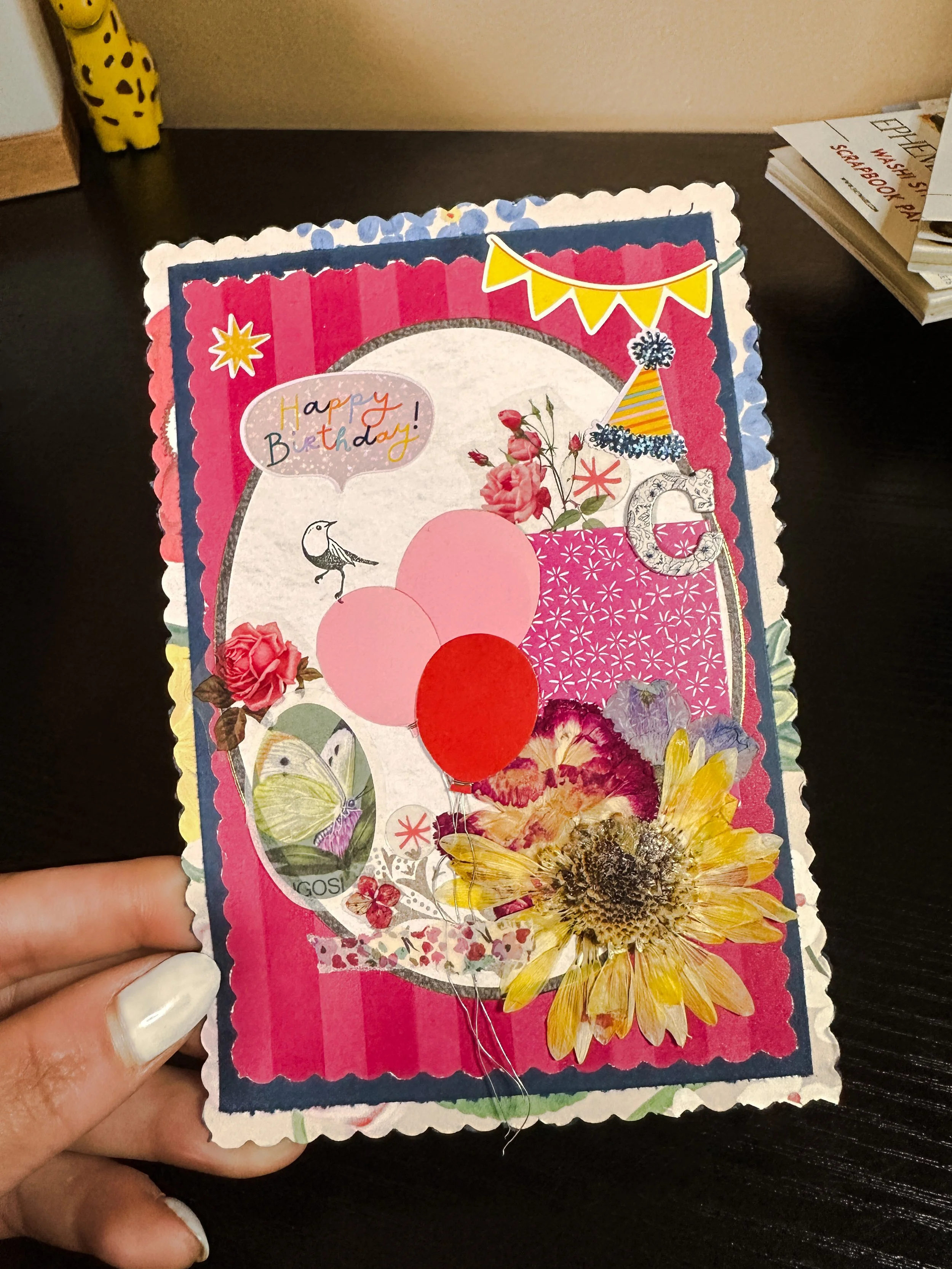 handmade colorful pink birthday card with pressed flowers and other embellishments