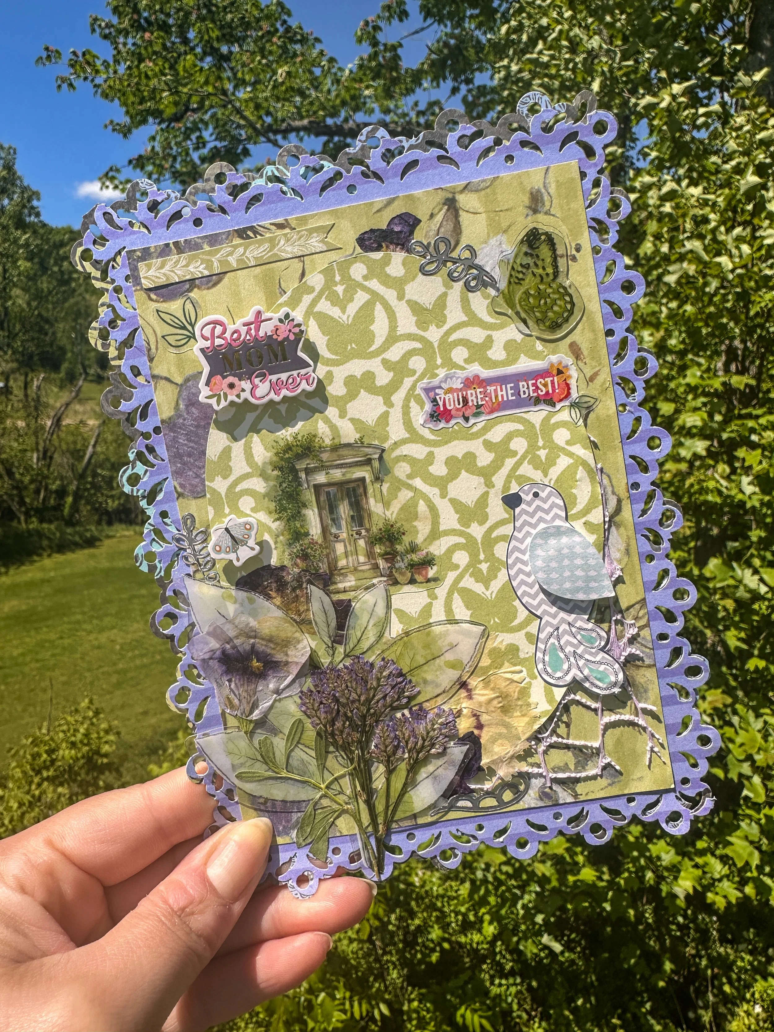 handmade lilac green mother's day card with pressed flowers and other embellishments