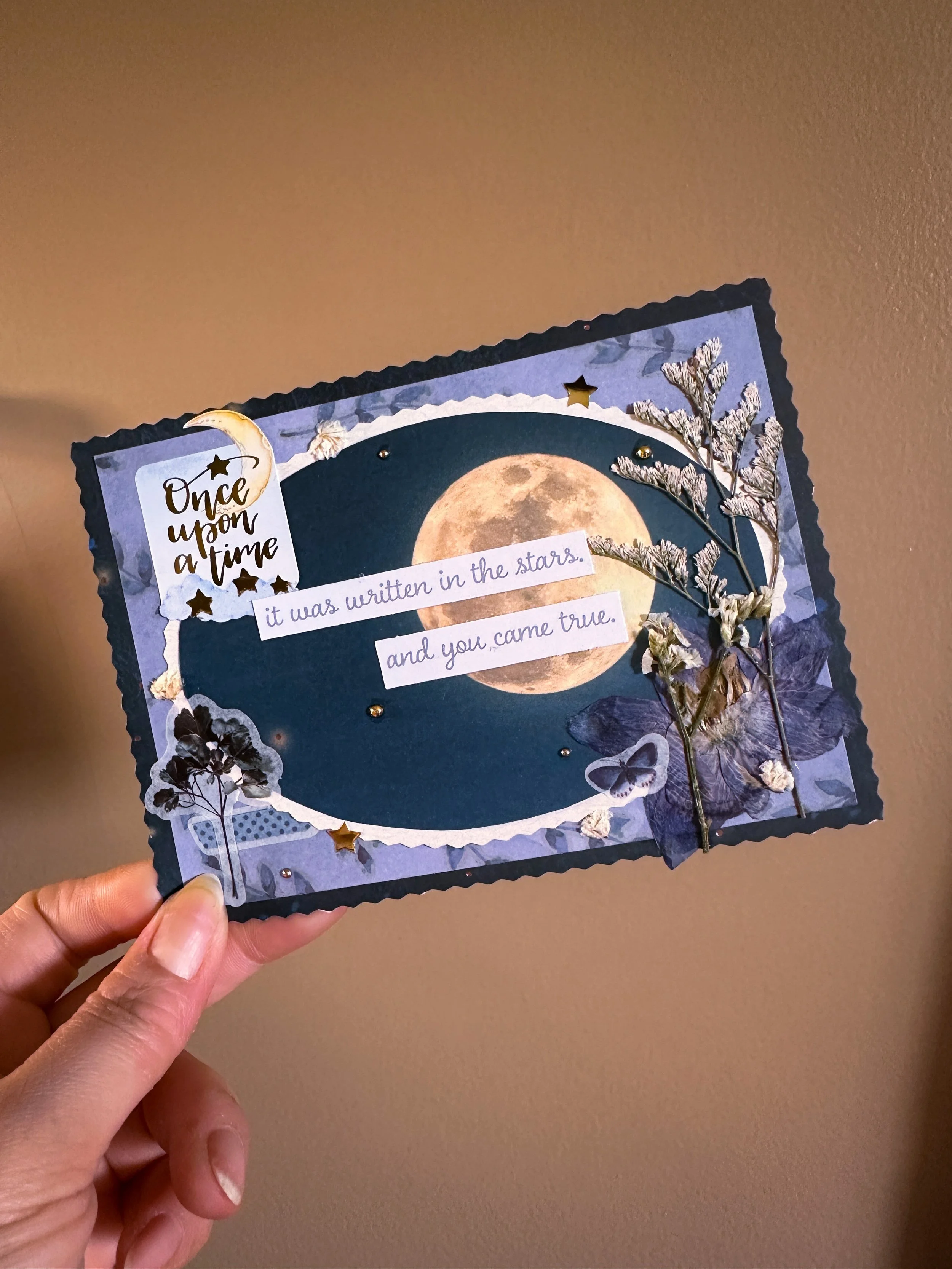 handmade once upon a time blue star themed new baby card with pressed flowers and other embellishments
