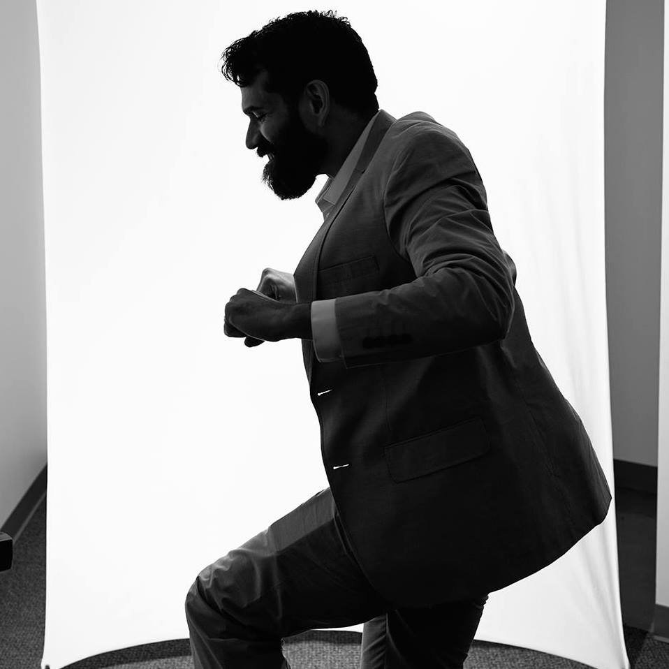 jon doing the running man in black and white