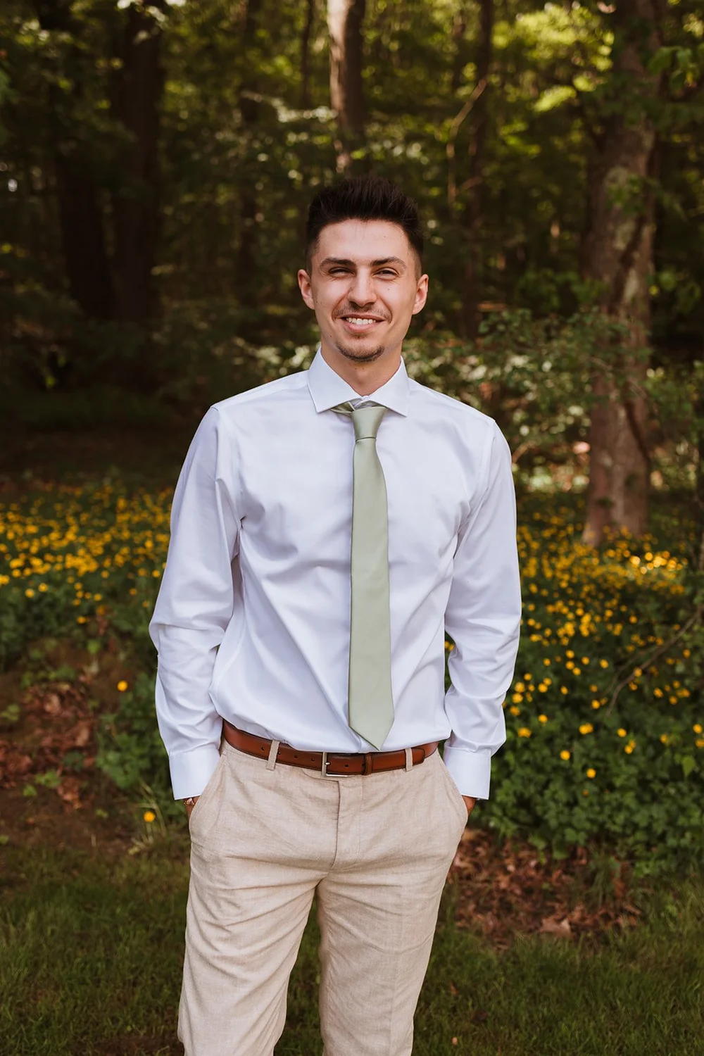 Groom portrait during getting ready portion of the day in Boswell.