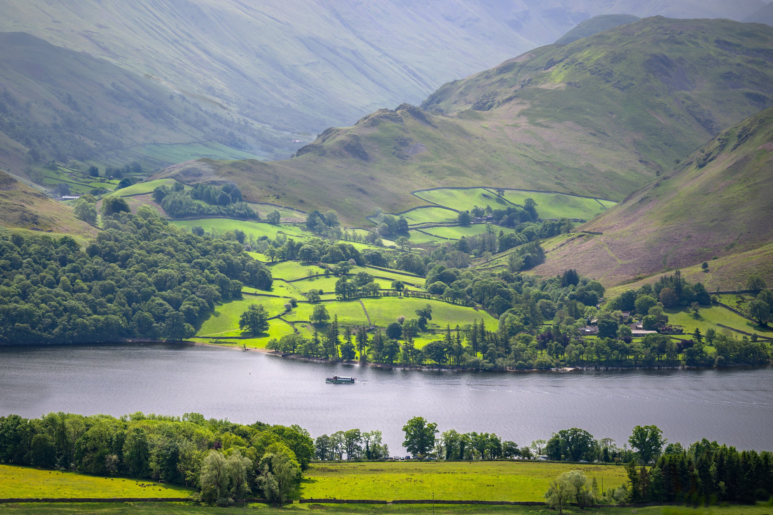 This landscape was viewed from above Ullswater (lake) as we were making our way down to Glenridding. The boat is a ferry between villages.