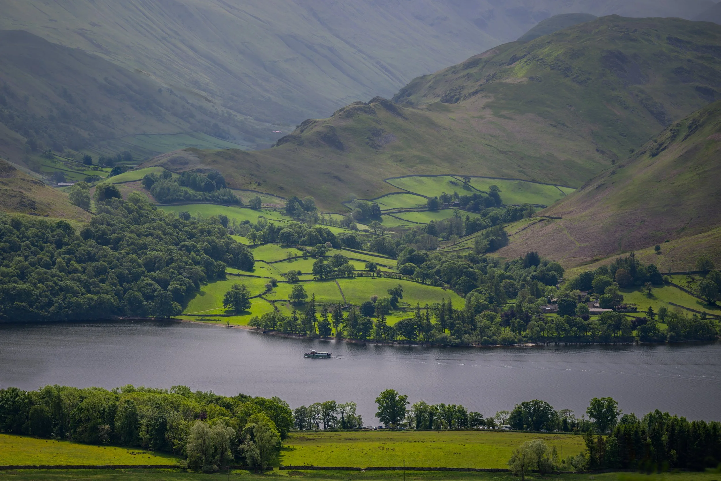 This landscape was viewed from above Ullswater (lake) as we were making our way down to Glenridding. The boat is a ferry between villages.