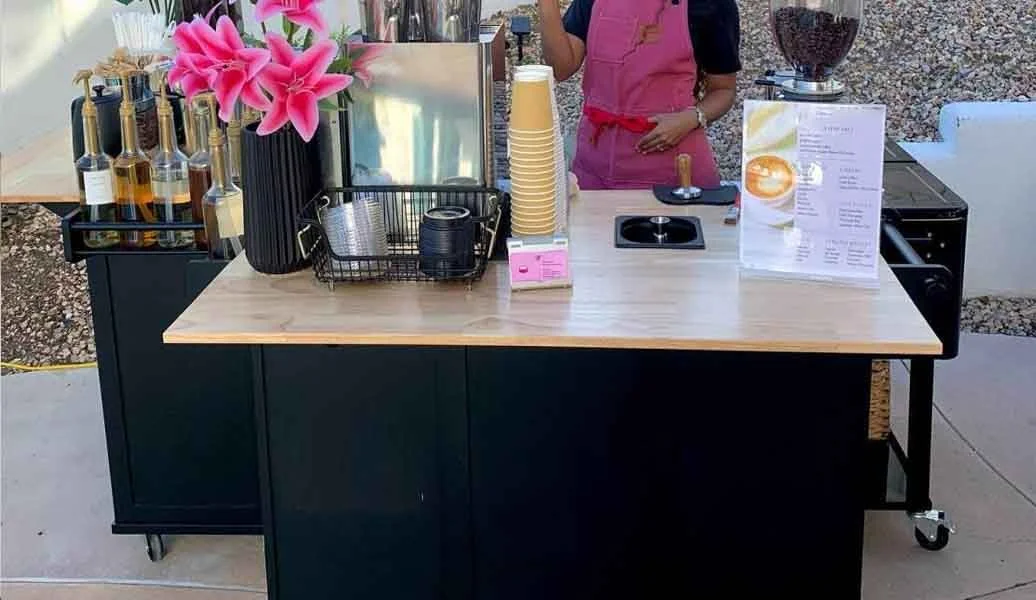 Mobile coffee cart catering an event in Plano, TX with fresh espresso drinks