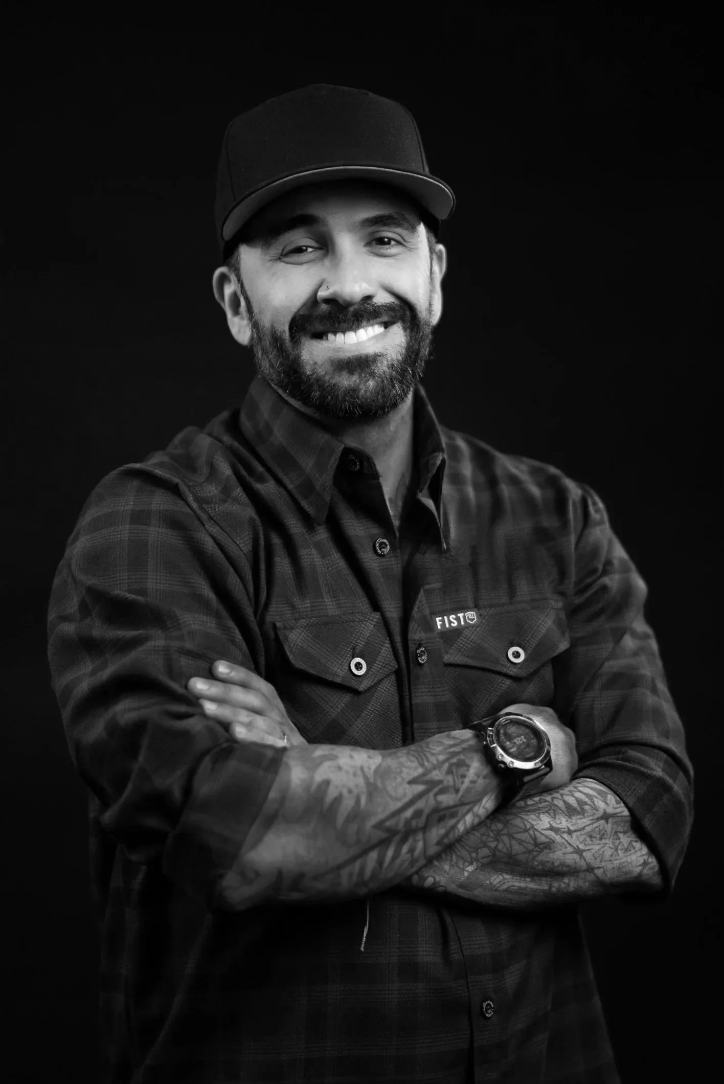 Black and white portrait of Mike Venidis, a home services digital marketing expert that gives back to the trades.