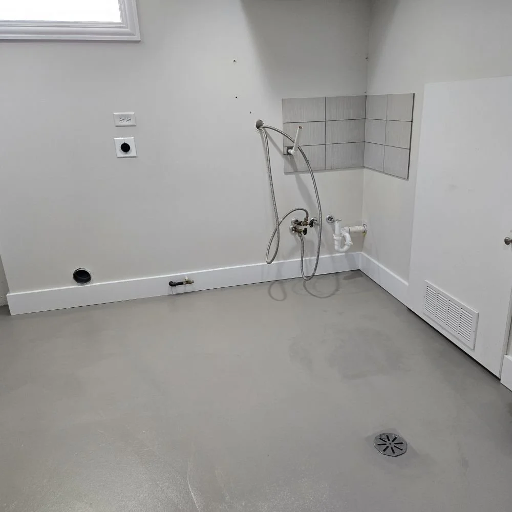 AFTER: Floor repainted and baseboards installed in Mt Prospect