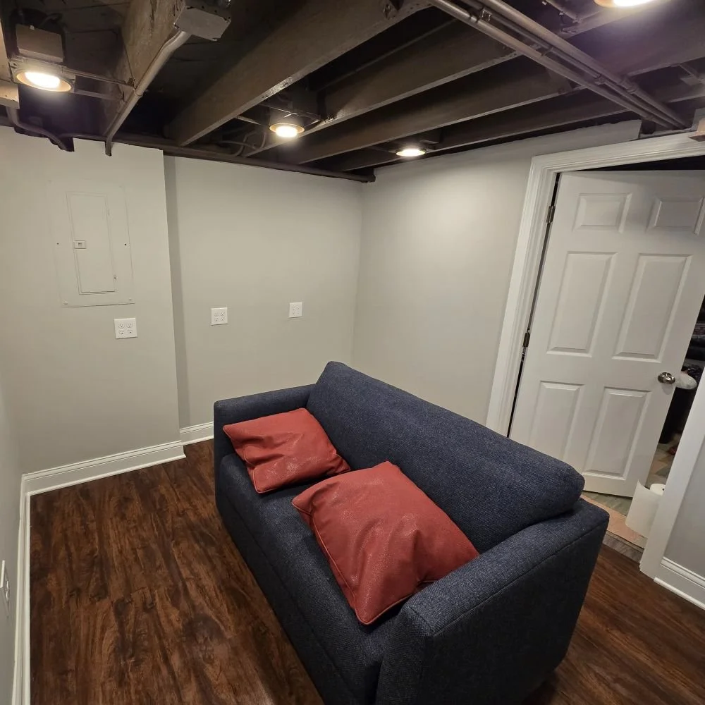 AFTER: Walls repaired and painted, trim and doors painted, new white outlets installed in Glen Ellyn