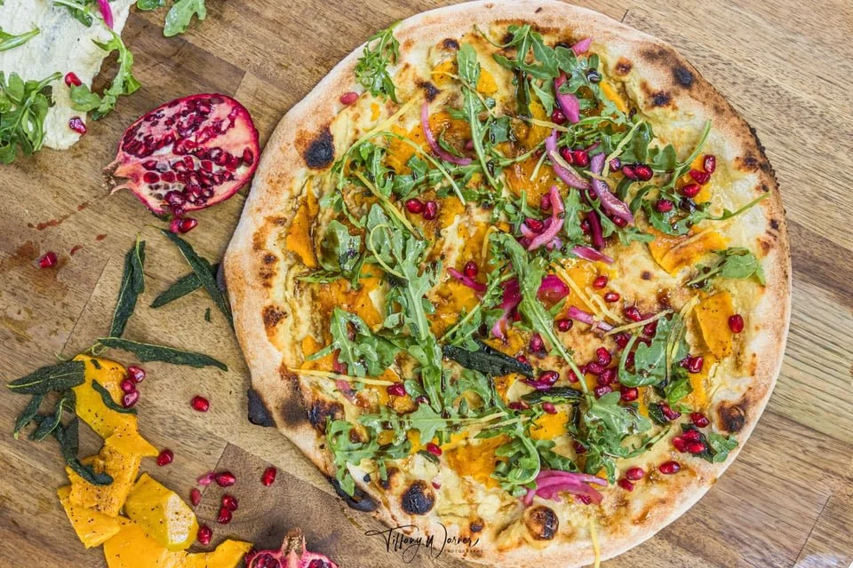Roast pumpkin and pomegranite pizza
