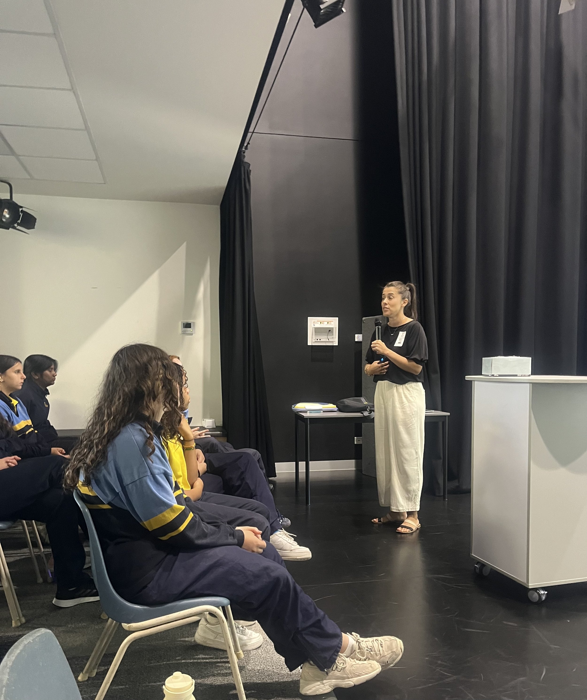 Keynote speaker Kat presenting to students.