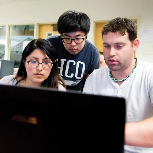 group-of-student-looking-at-computer.jpg